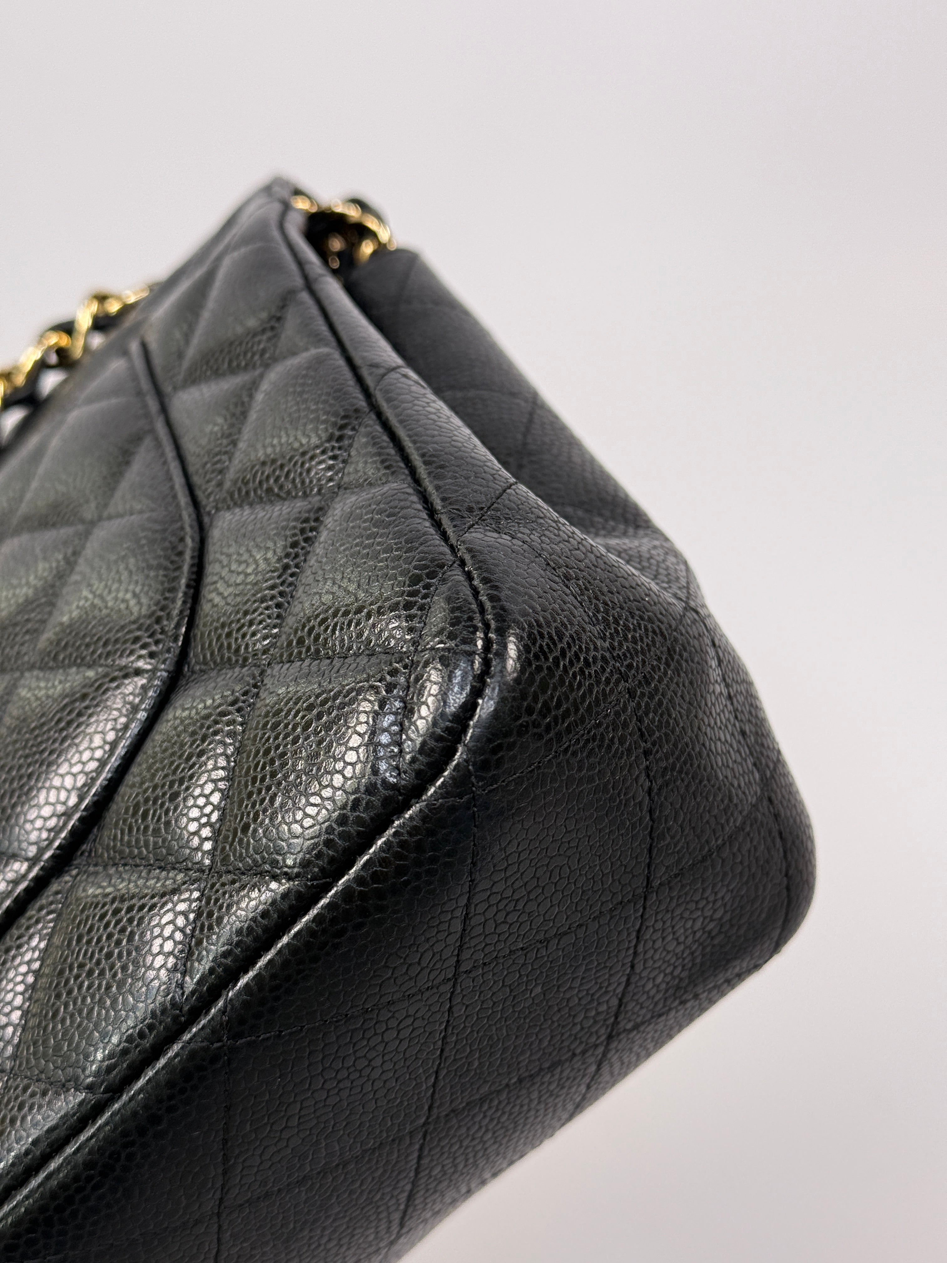 Chanel Classic Jumbo Flap Bag In Black Caviar LeatherWith Gold Hardware
Pre Loved & Authentic