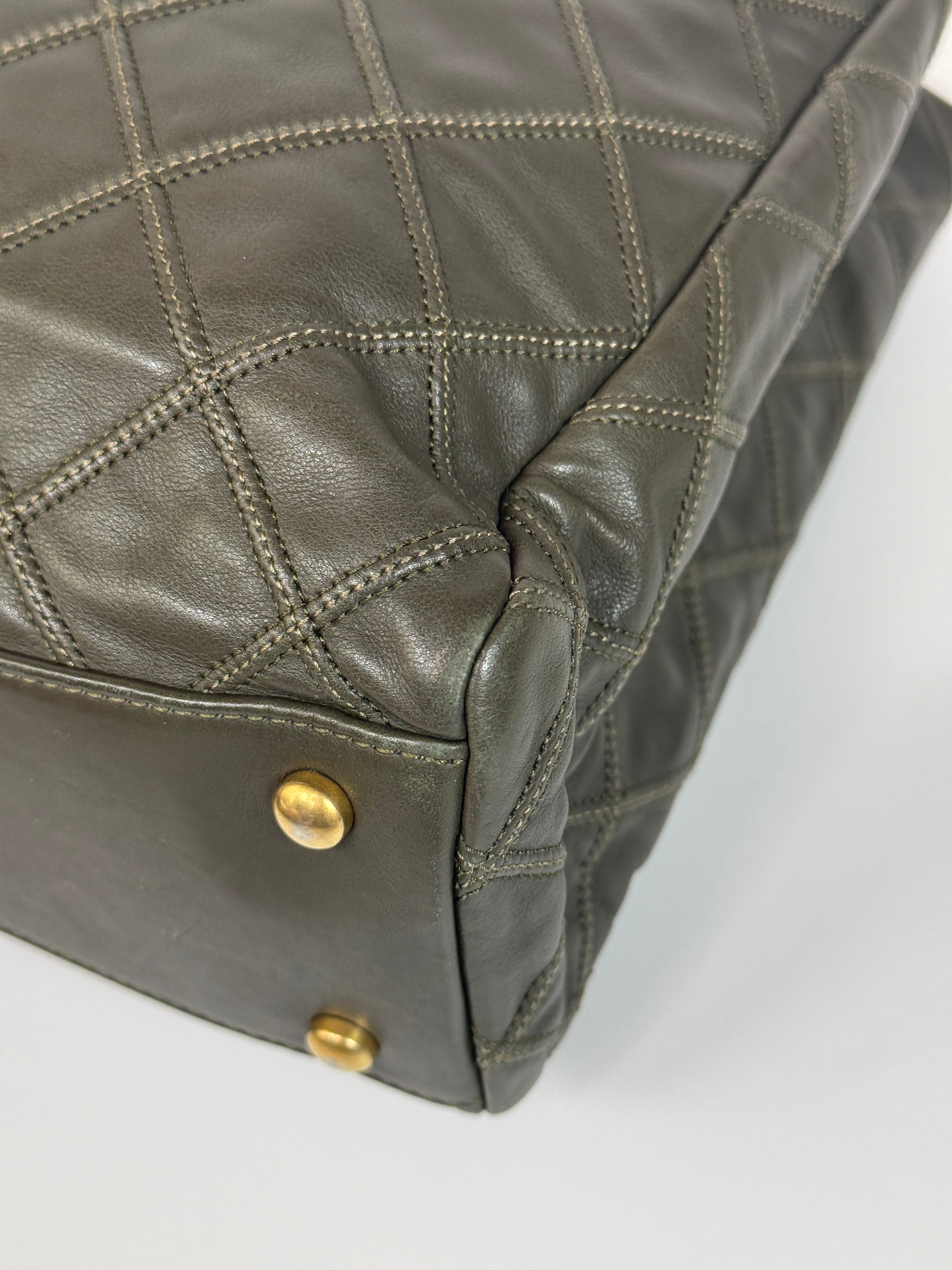 Authentic and preloved Chanel Dark Green Lambskin Leather Tote Bag With Gold Hardware very good condition. 100% Authenticity Guarantee
