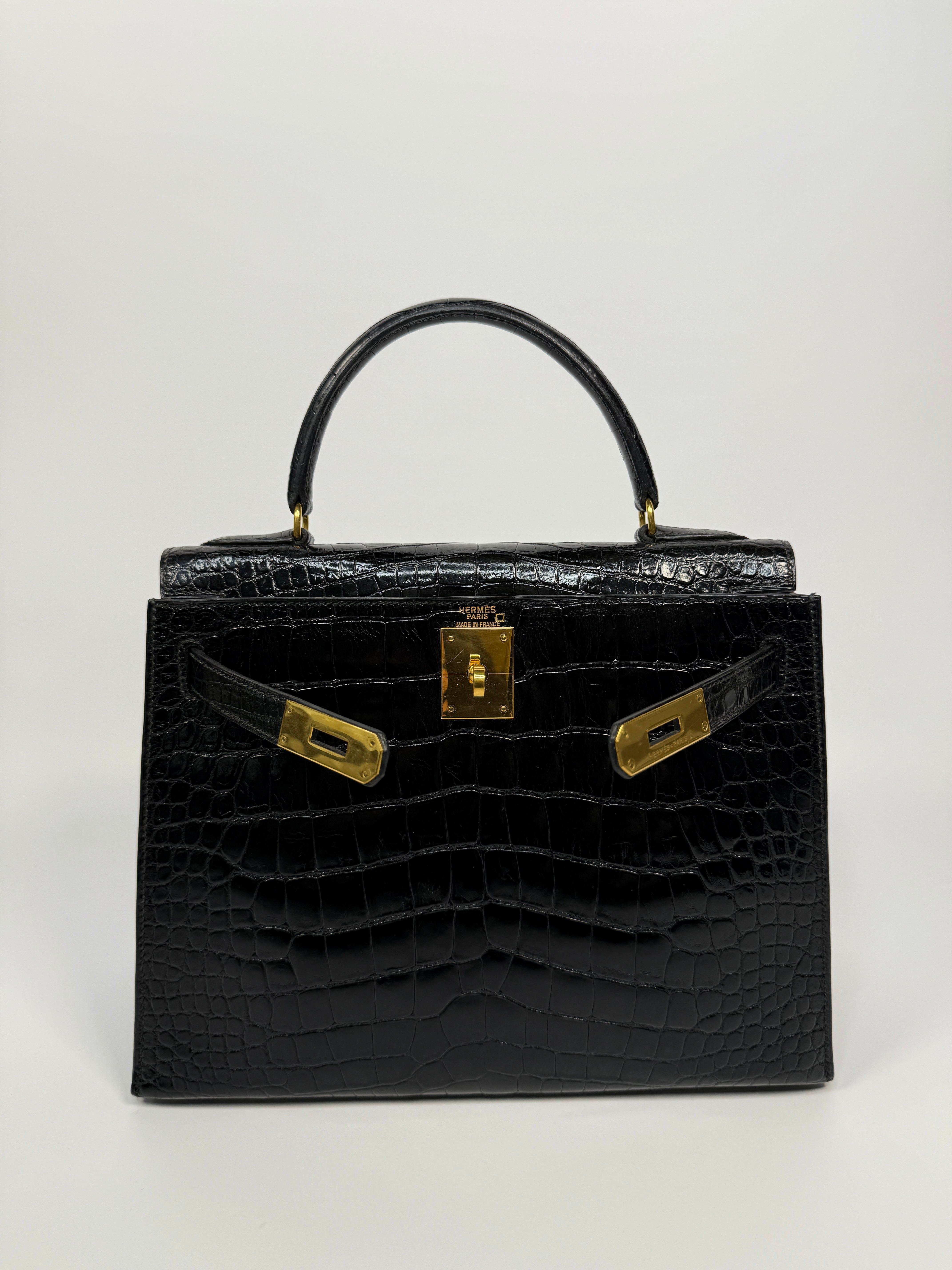 Hermès Vintage Kelly 28 In Shiny Black Crocodile With Gold Hardware Authentic