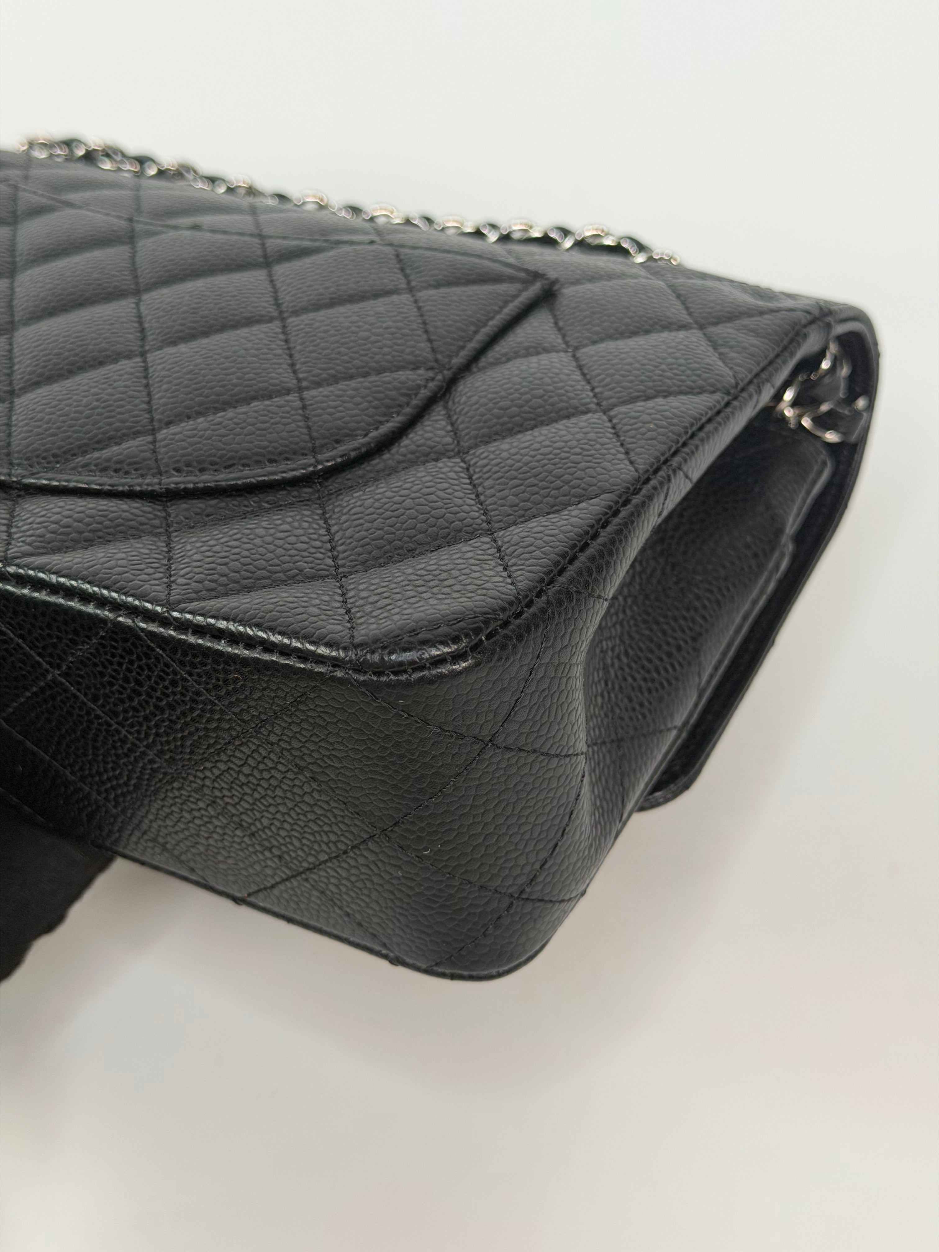 Chanel Vintage Medium Classic Double Flap Black Caviar Silver Hardware. 100% authentic and preloved in excellent condition
