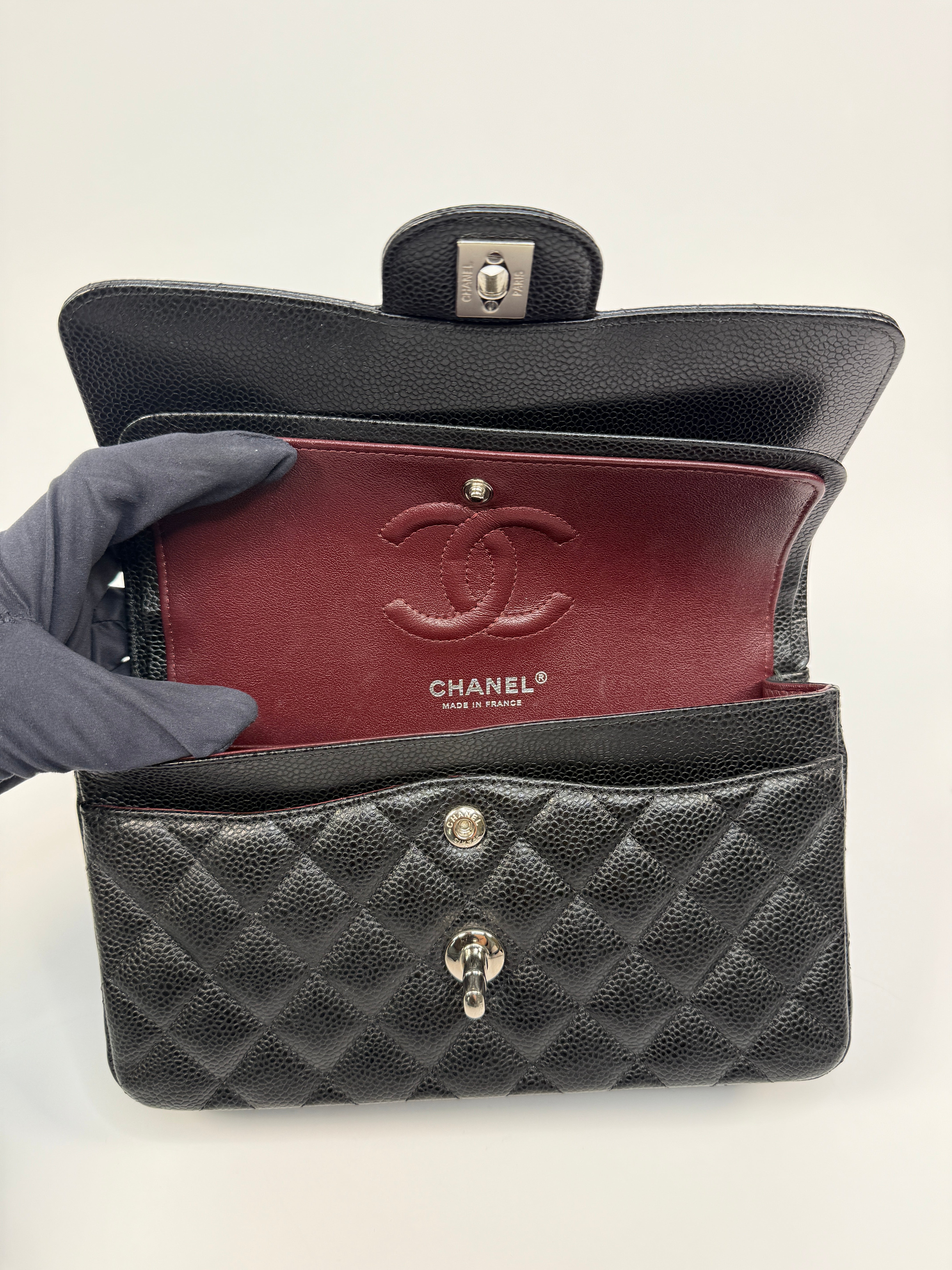 Chanel Small Classic Double Flap In Black Caviar Leather With Silver Hardware
Pre Loved & Authentic