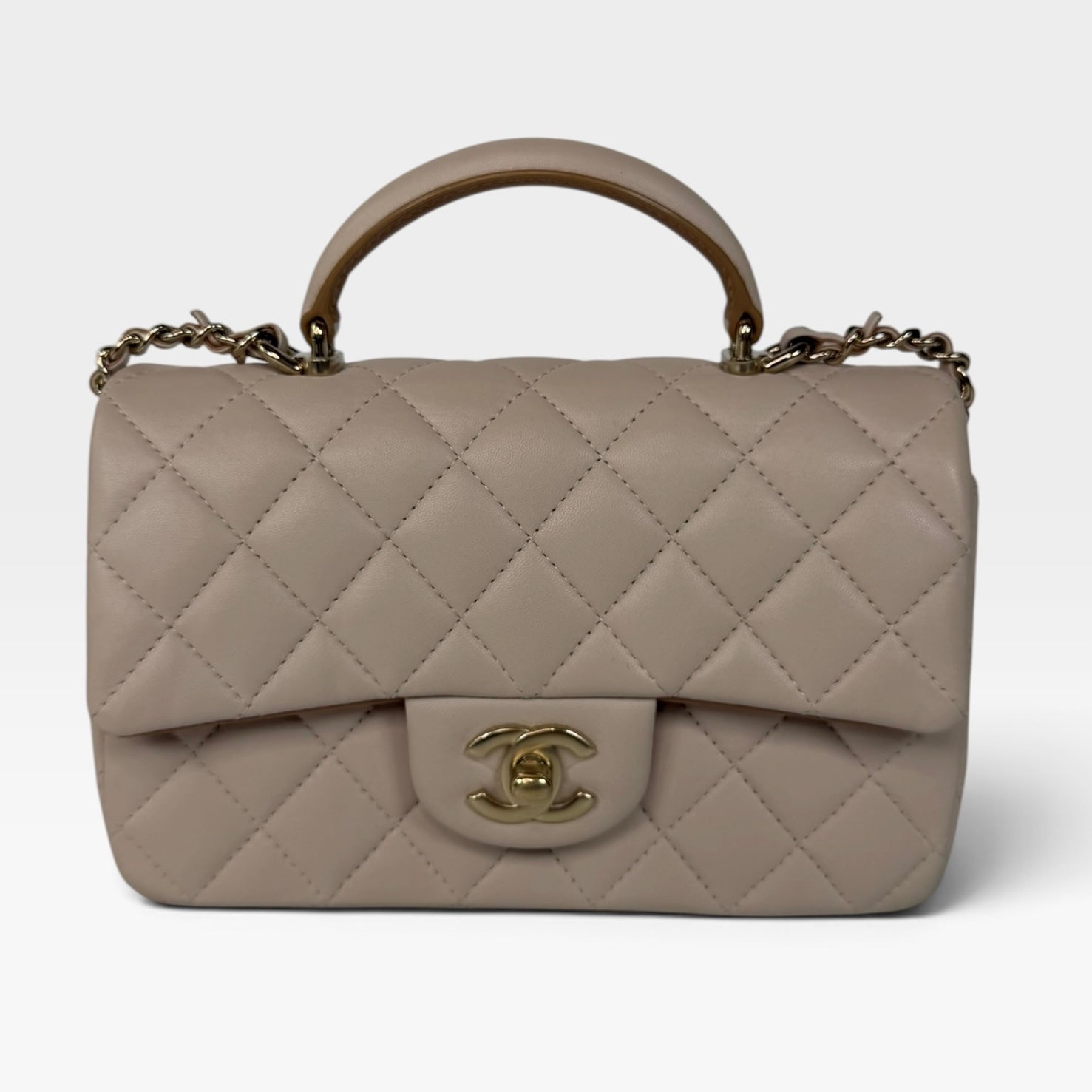 Chanel Mini Rectangle Top Handle Light Beige Lambskin Pale Gold Hardware in excellent condition 100% authentic and preloved