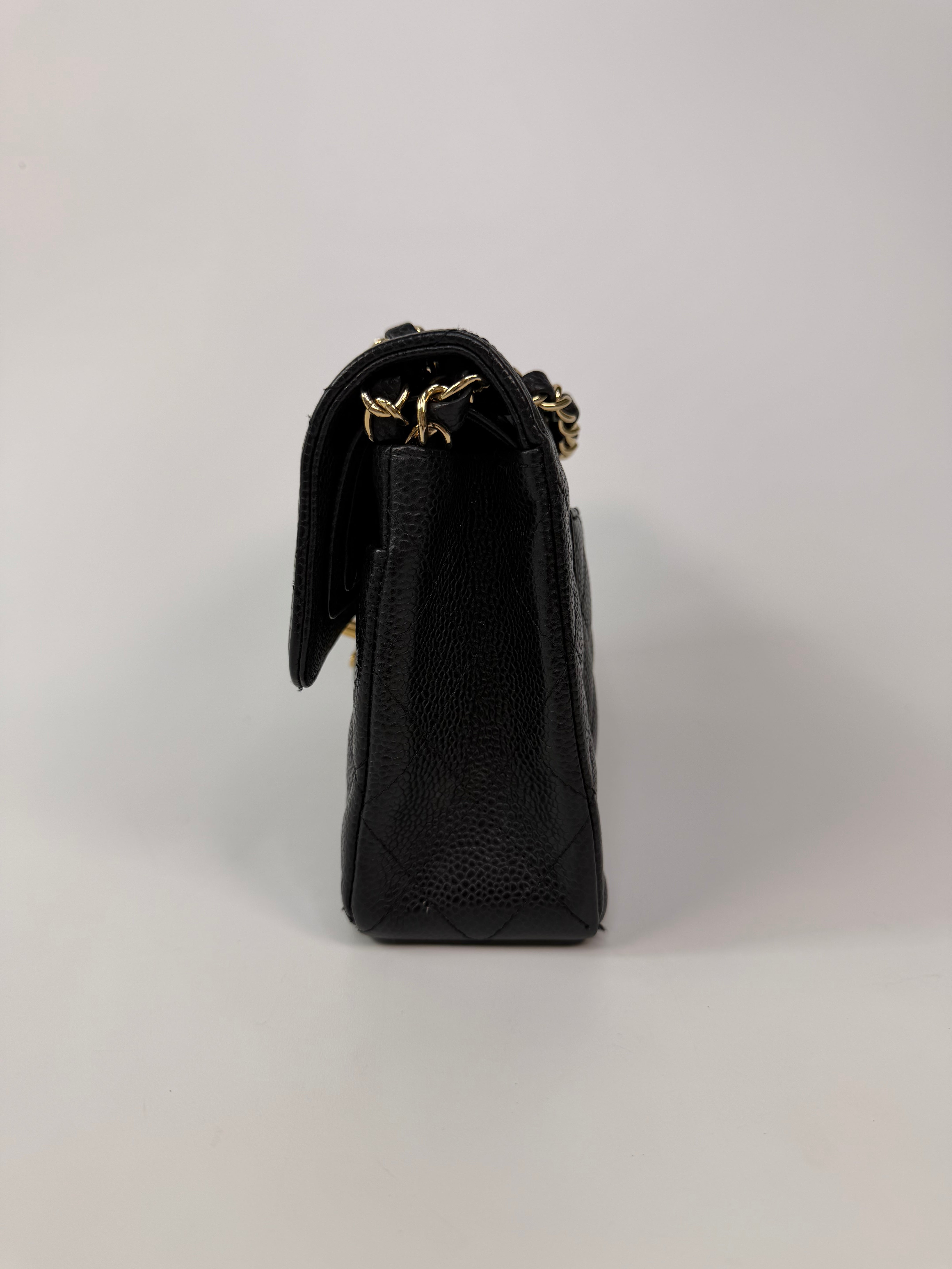 Chanel Small Classic Double Flap In Black Caviar Leather With Gold Hardware. 100% authentic and preloved in excellent condition