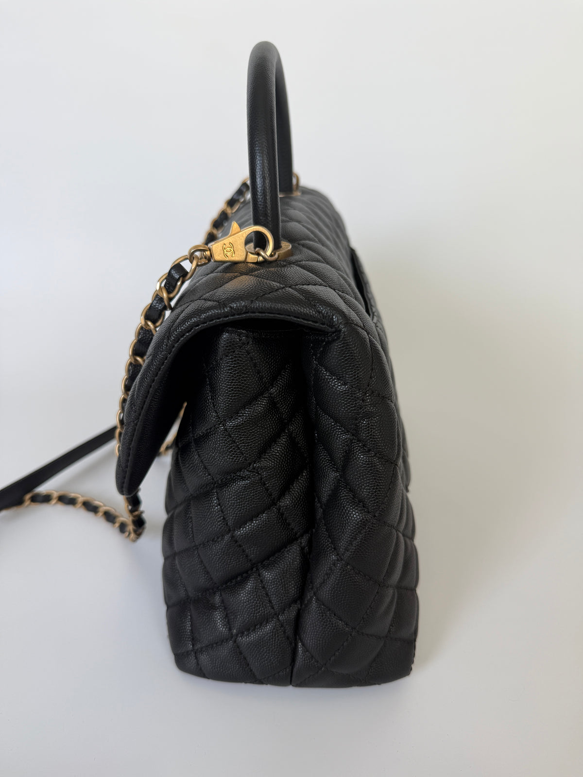 Chanel Coco Large Top Handle In Caviar Leather With Gold Hardware. Verified by Luxe Cheshire. Trusted designer resale.