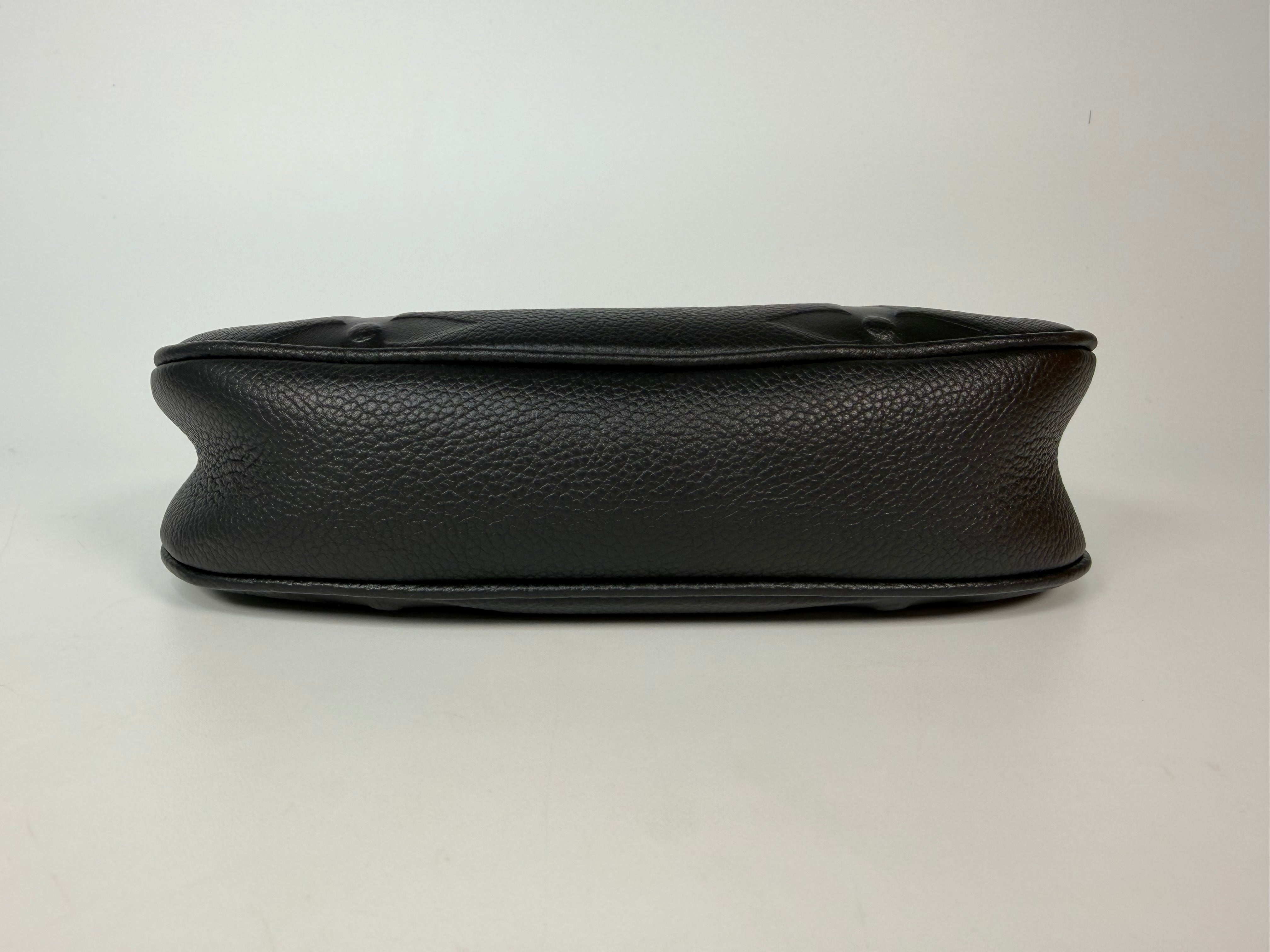 Louis Vuitton Mini Moon Bag In Black Leather With Gold Hardware in excellent condition 100% authentic and preloved
