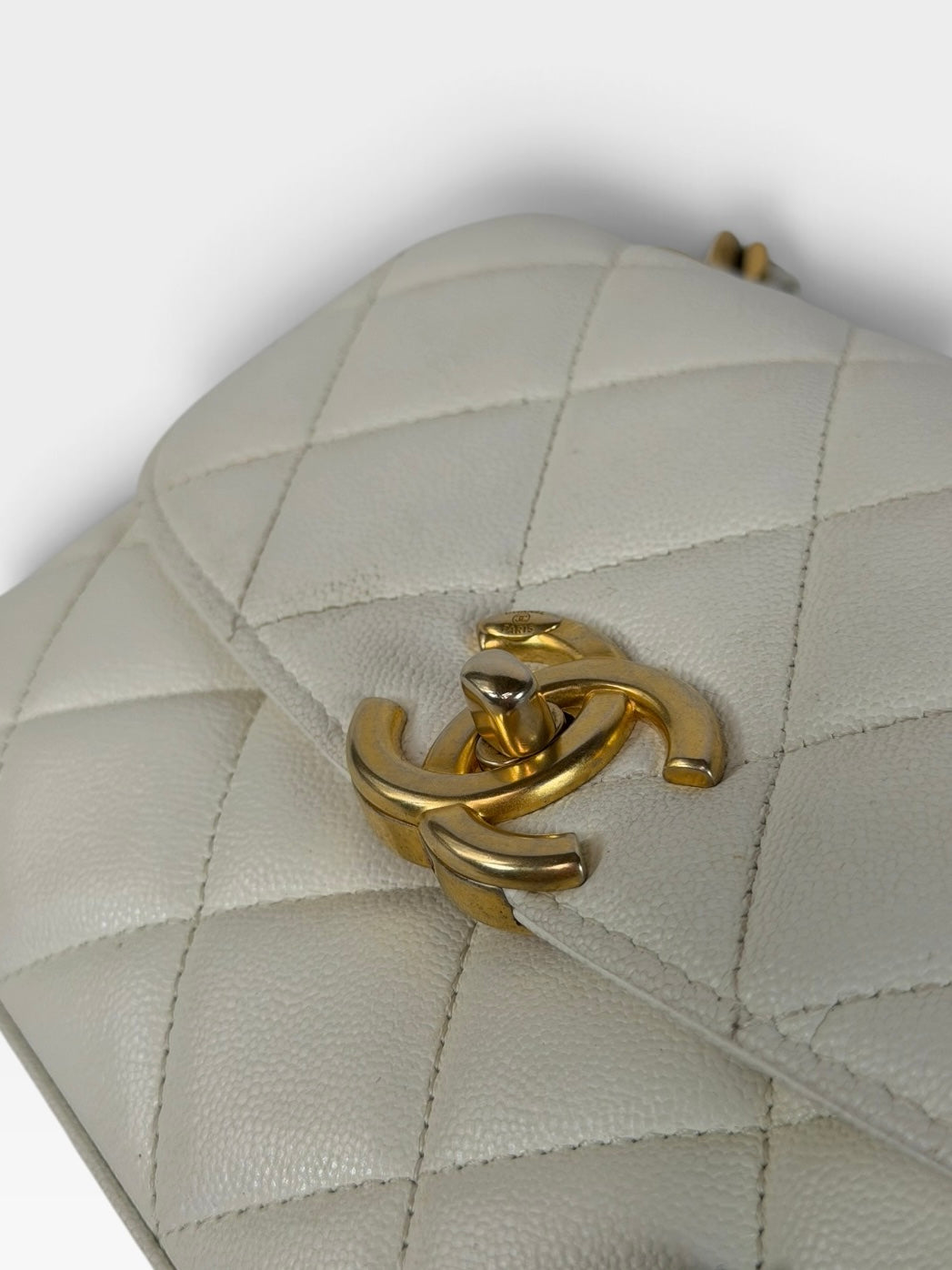 Chanel Mini Flap In White Caviar Leather With Gold Hardware 100% authentic and preloved in excellent condition