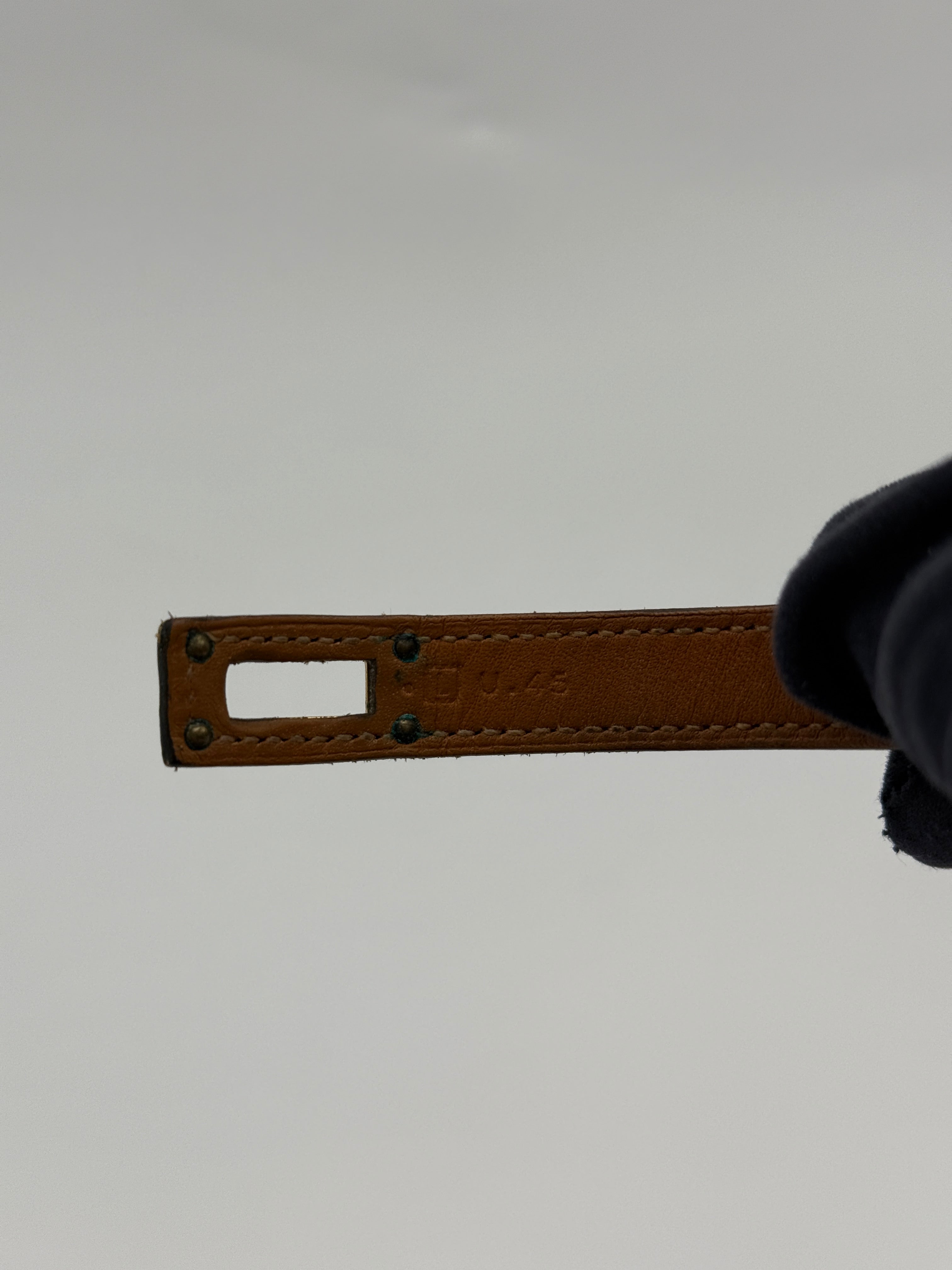 Hermès Kelly Double Tour Bracelet in black leather with gold hardware