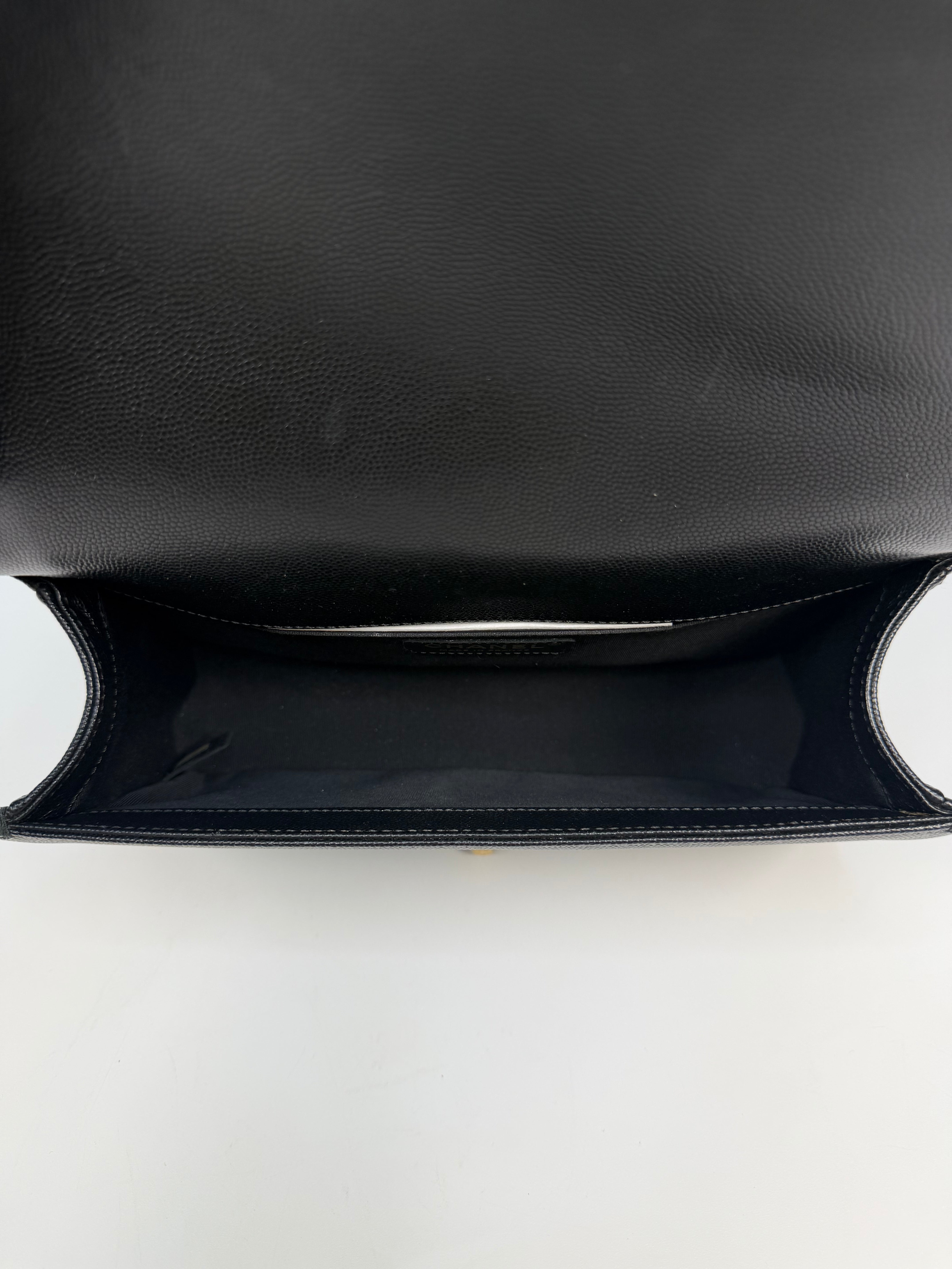 Chanel Boy Bag In Black Caviar Leather With Gold Hardware. Authentic and preloved in excellent condition. Insured next day delivery. Verified by Luxe Cheshire