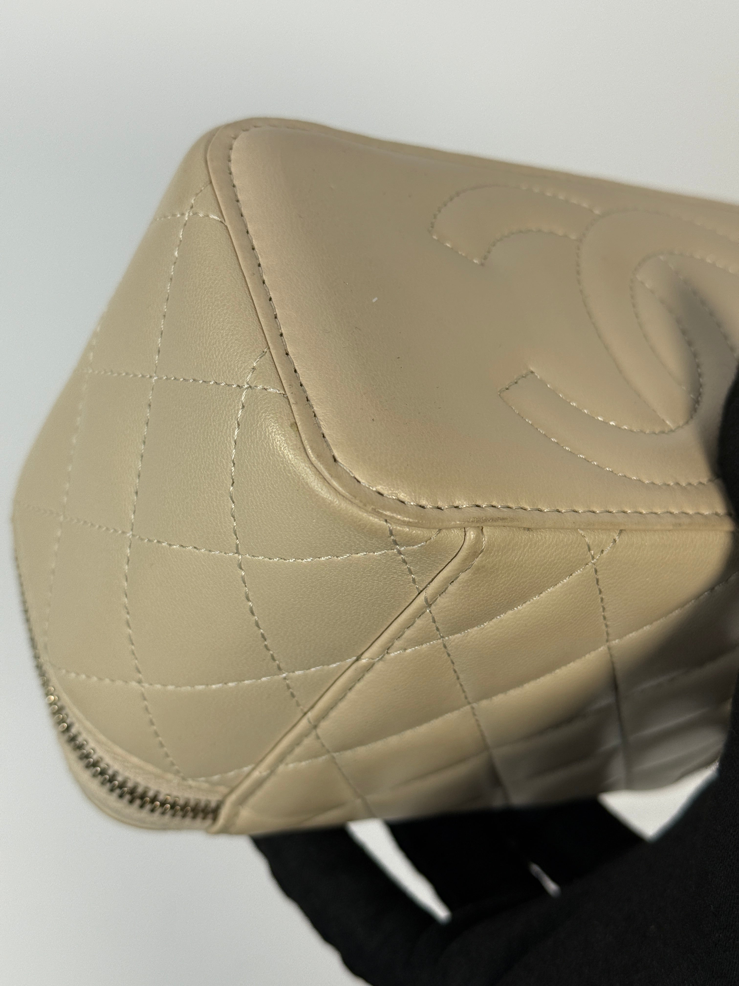 Chanel Vanity Rectangular Top Handle Ecru/Beige Lambskin With Gold Hardware Authentic and preloved. Excellent condition.