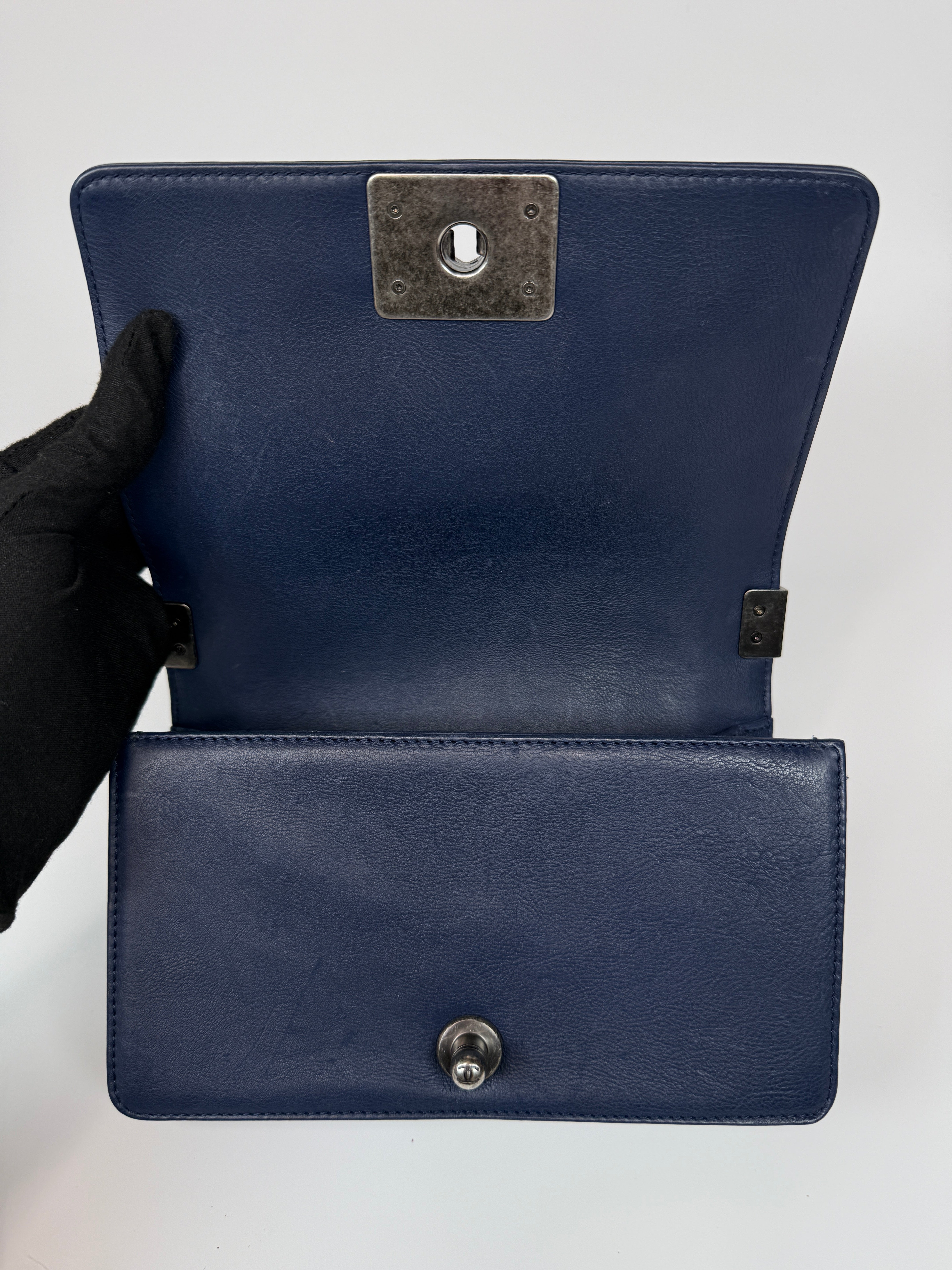 Chanel Mini Boy Bag In Navy Lambskin With Ruthenium Hardware In Excellent Condition.
Authentic Pre Loved Verified by Luxe Cheshire Trusted Designer resale