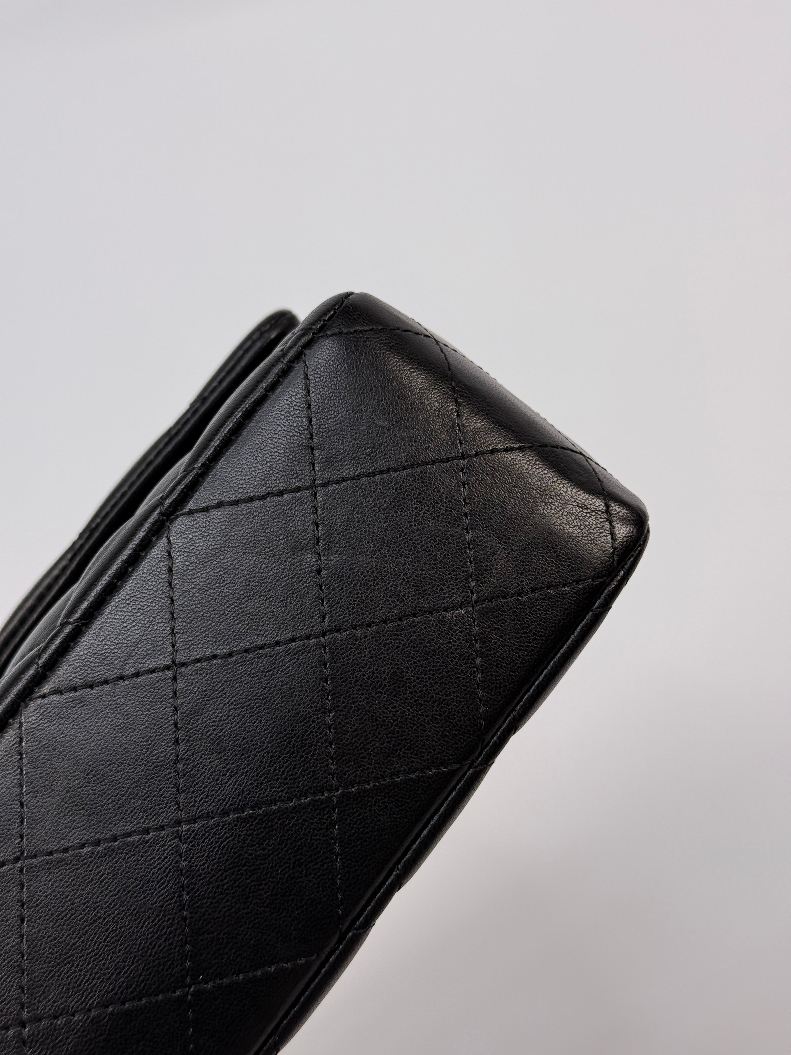 Chanel Medium Classic Double Flap Black Lambskin Leather With Silver Hardware
Pre Loved & Authentic