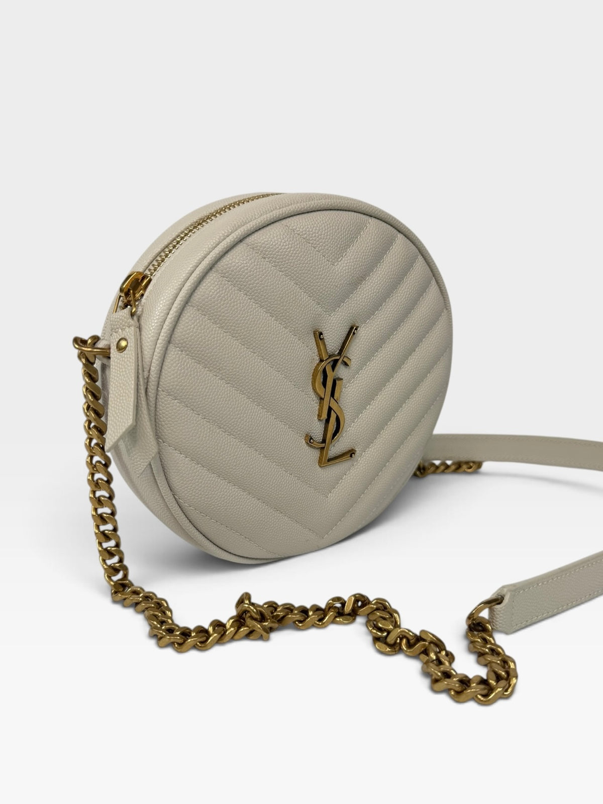 Saint Laurent Vinyle Round Bag In Stone Matelasse Chevron With Gold Hardware. 100% authentic and preloved in excellent condition