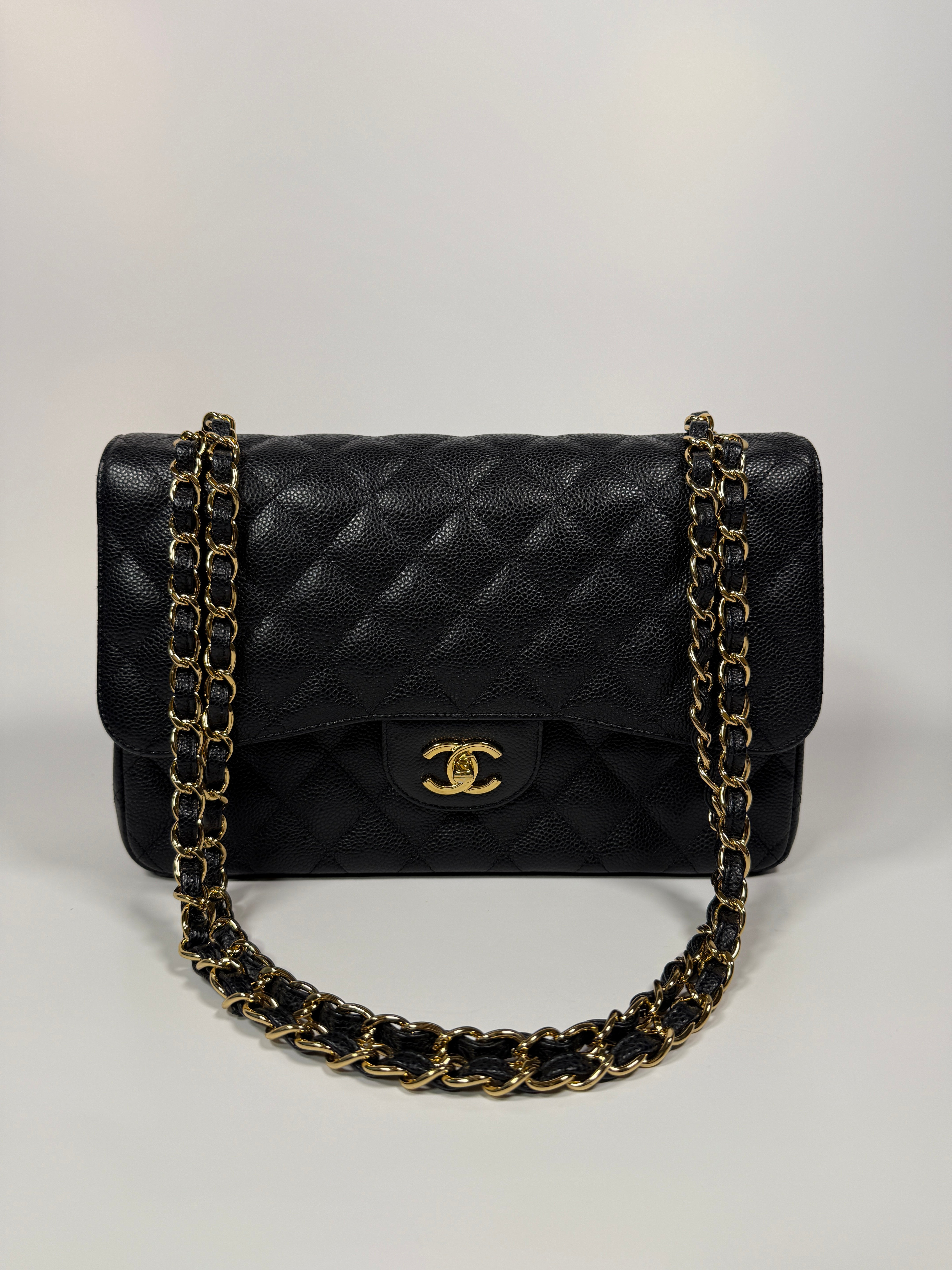 Chanel Classic Jumbo Flap Bag In Black Caviar Leather With GHW