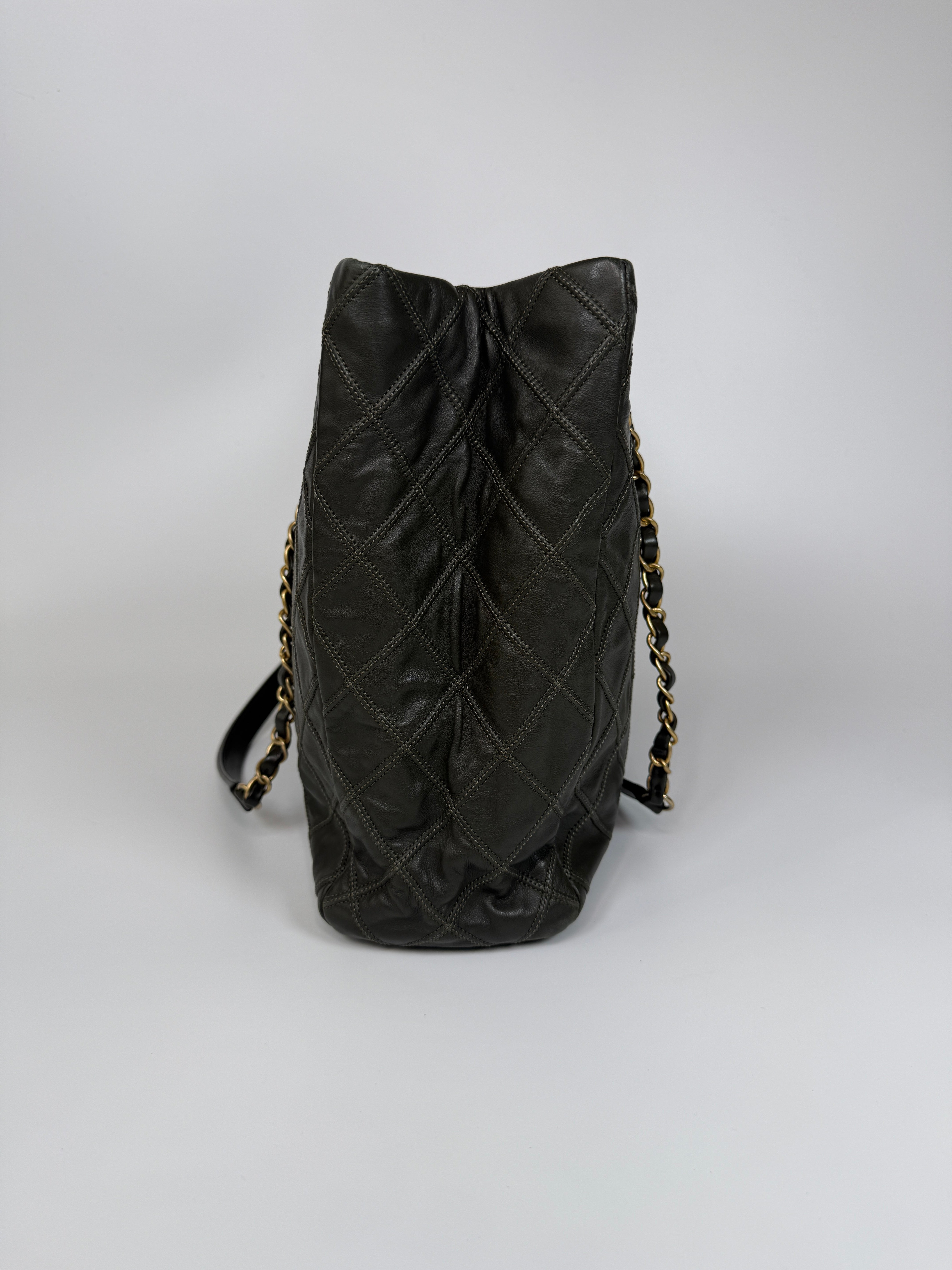 Authentic and preloved Chanel Dark Green Lambskin Leather Tote Bag With Gold Hardware very good condition. 100% Authenticity Guarantee