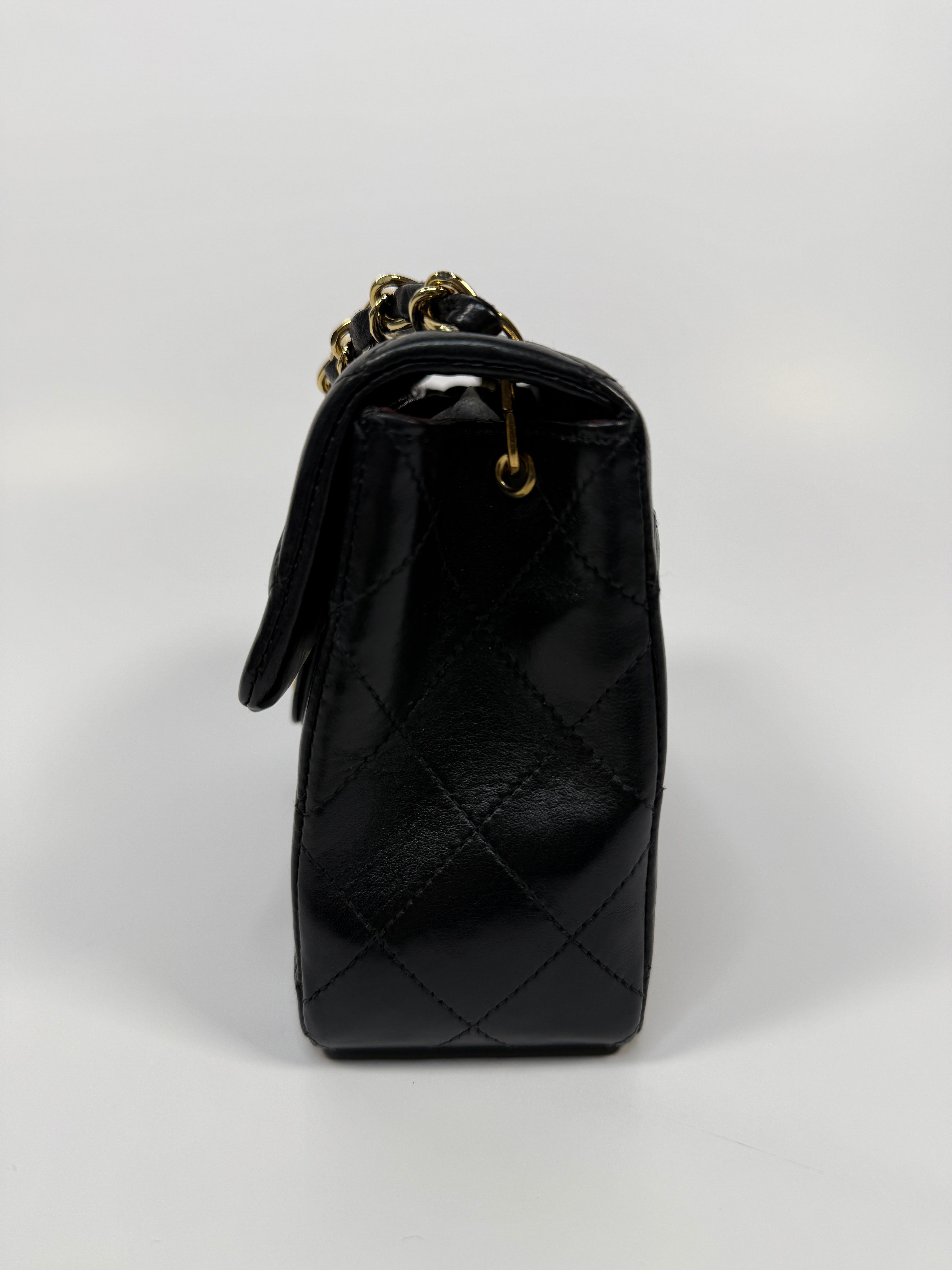 Chanel Black Square Vintage Flap Bag In Lambskin With Gold Hardware
Pre Loved & Authentic