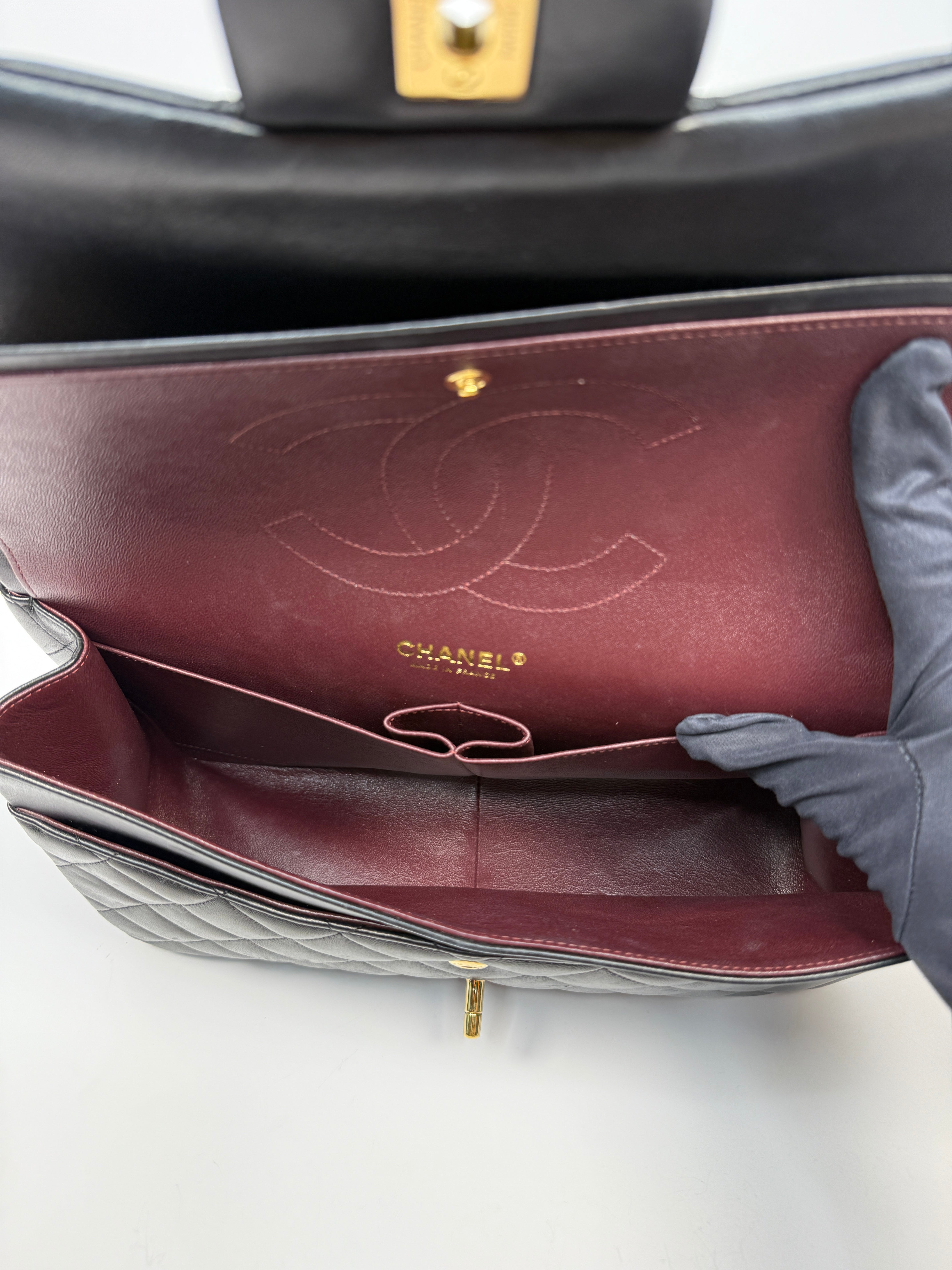 Chanel Jumbo Classic Flap Bag In Black Lambskin Leather With Gold Hardware
Pre Loved & Authentic