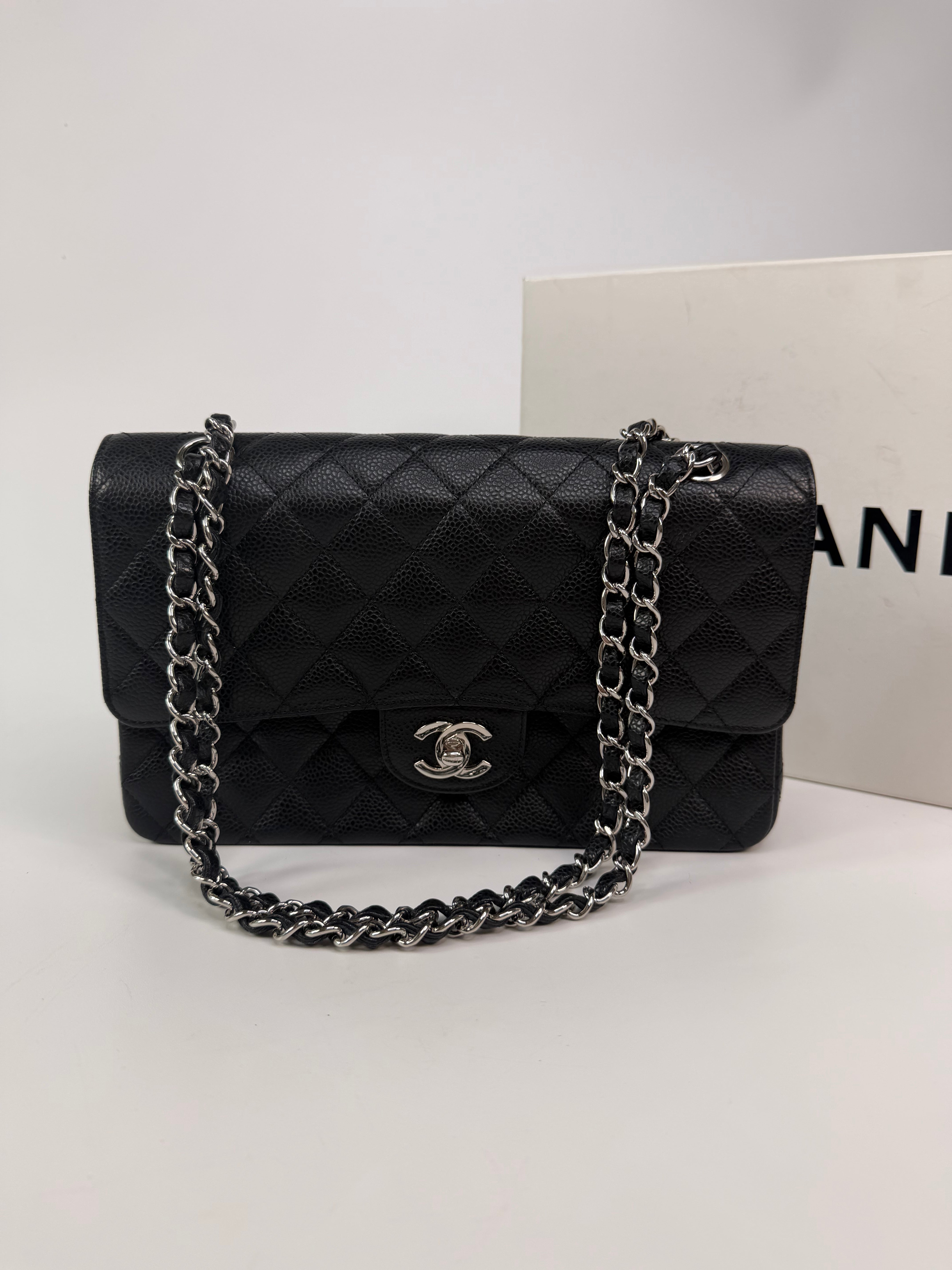 Chanel Vintage Medium Classic Double Flap Black Caviar Silver Hardware. 100% authentic and preloved in excellent condition