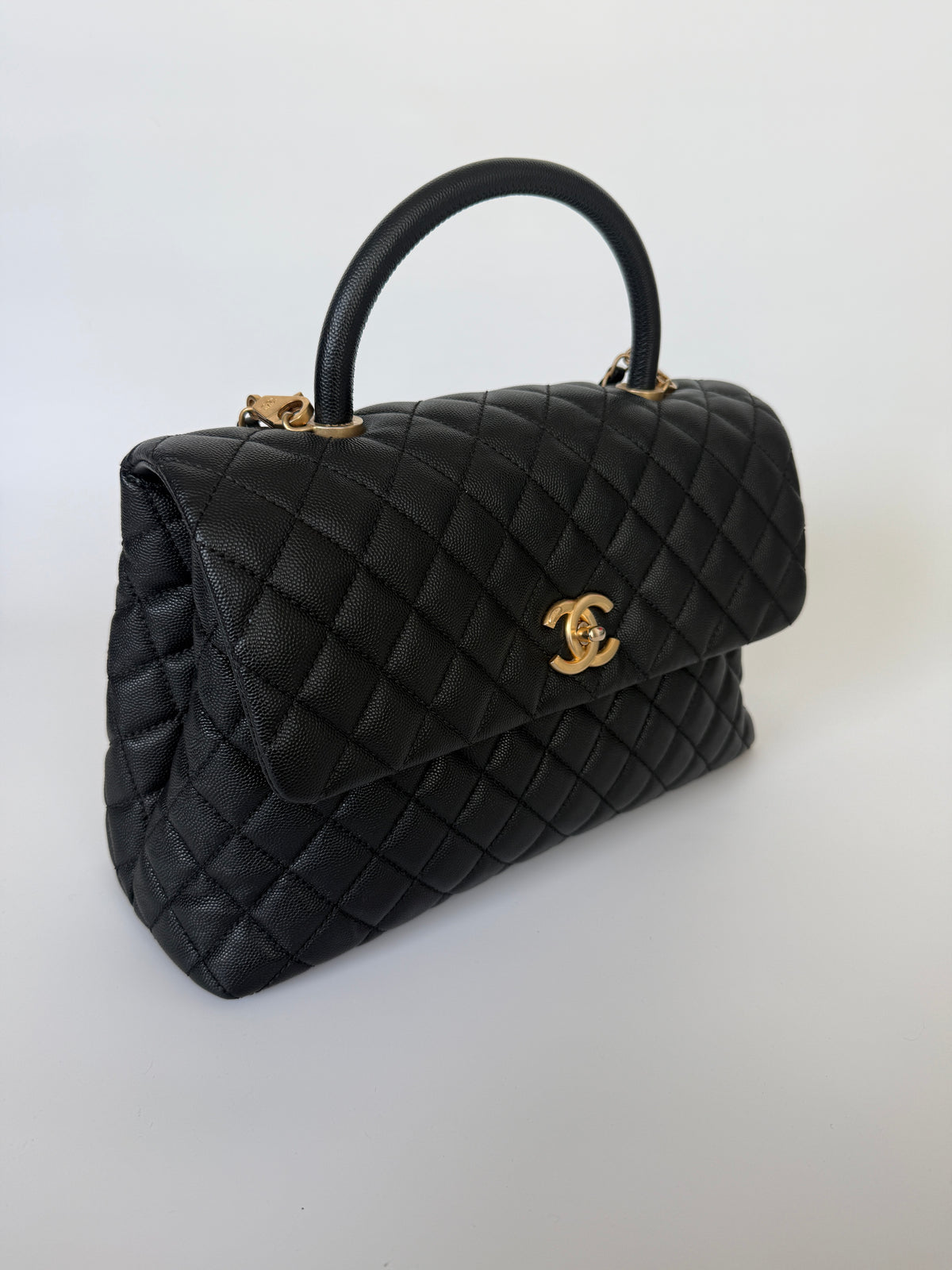 Chanel Coco Large Top Handle In Caviar Leather With Gold Hardware. Verified by Luxe Cheshire. Trusted designer resale.