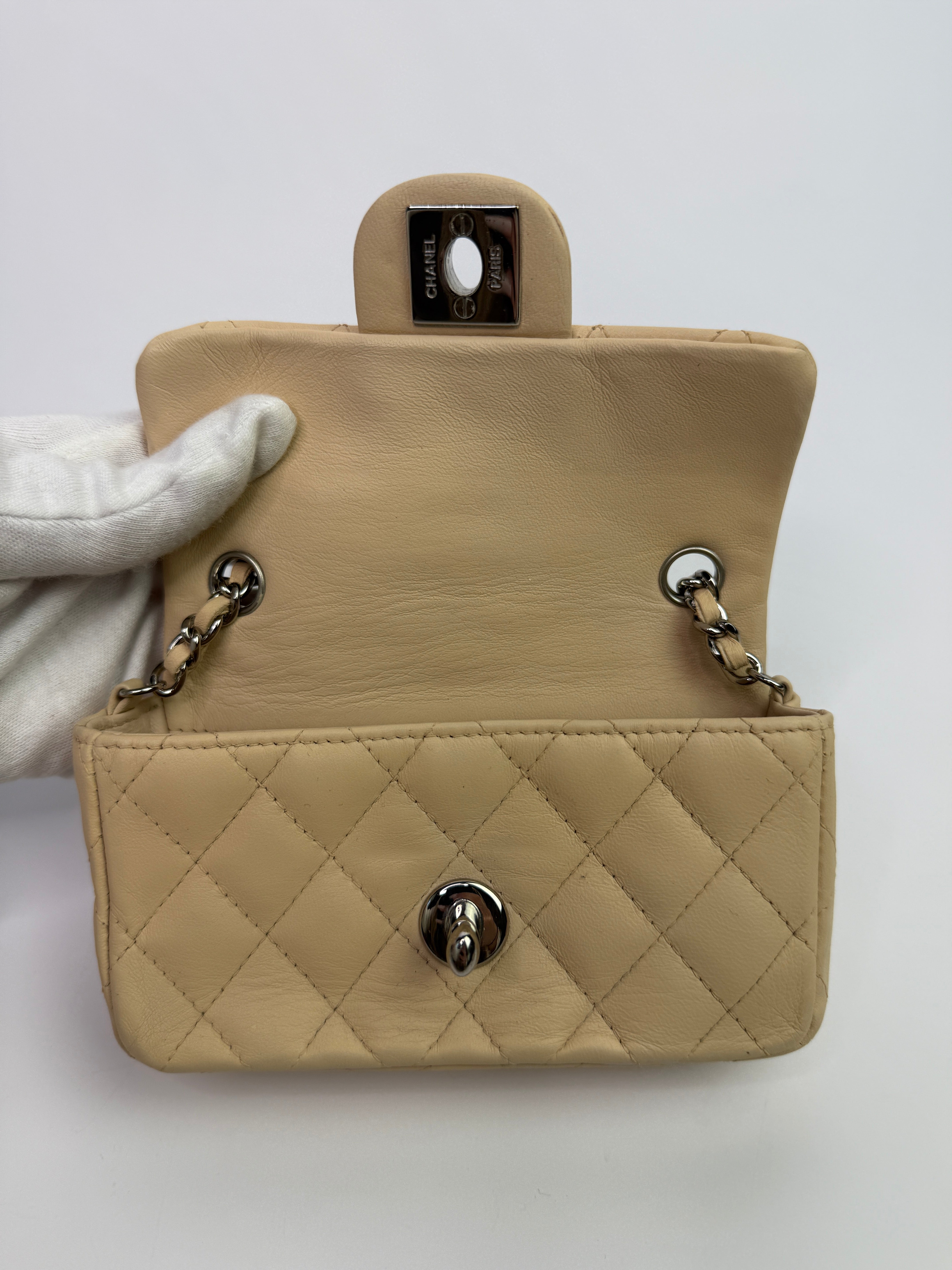 Chanel Super Mini Classic Flap Bag In Beige Lambskin With SHW