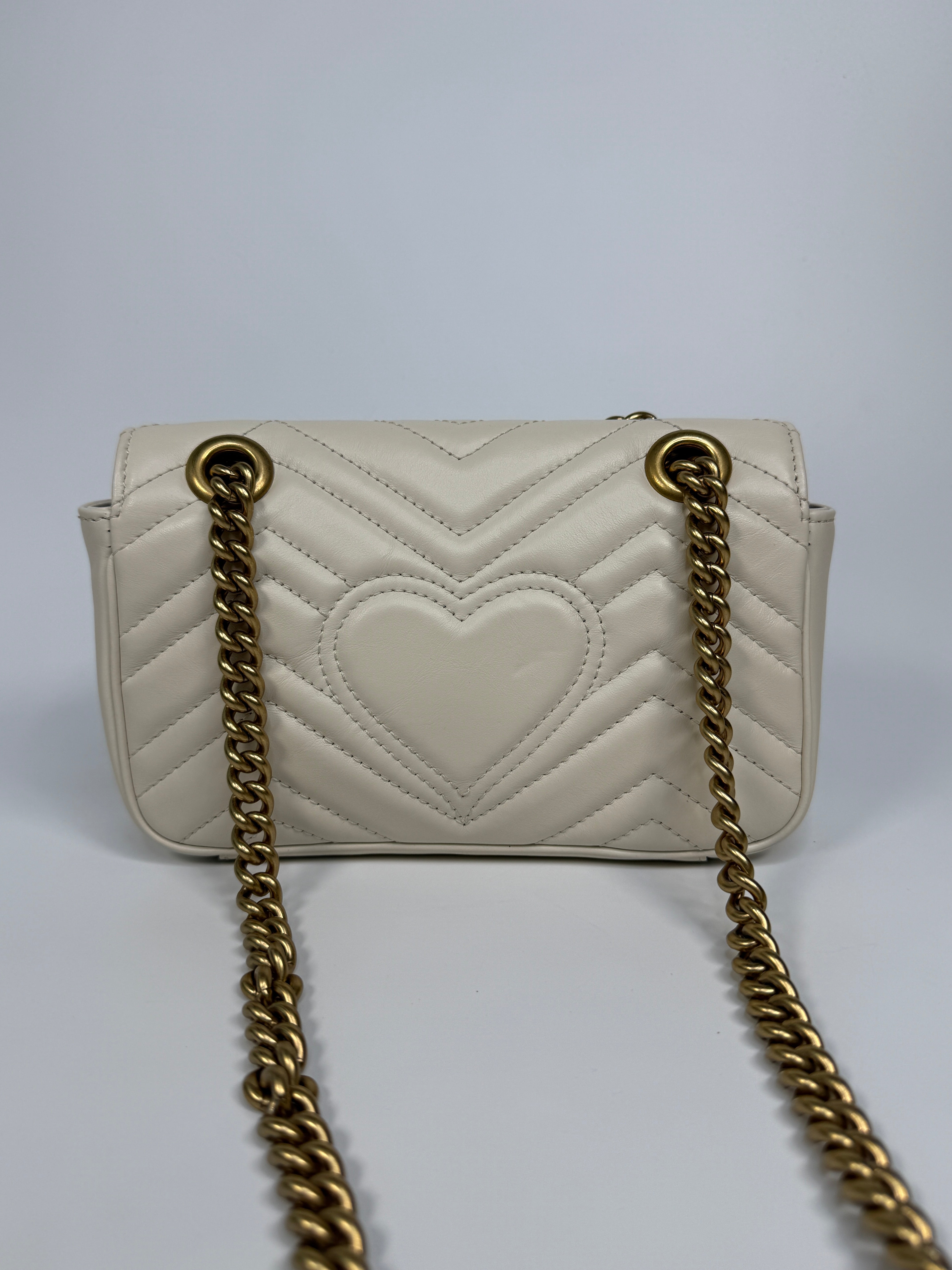 Gucci GG Small Marmont Matelasse Shoulder Bag In Ivory Leather With Gold Hardware