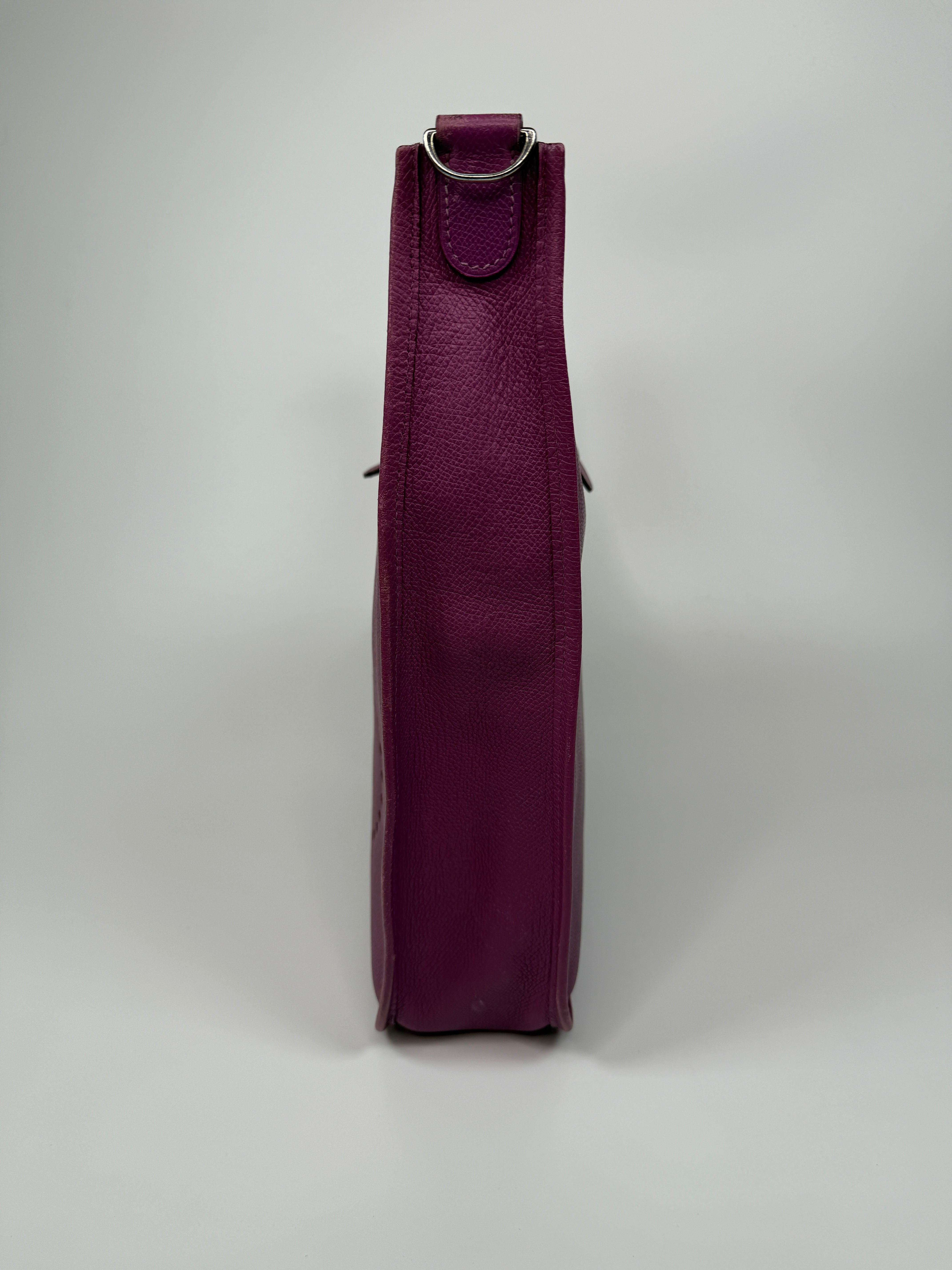 Authentic and preloved Hermès Evelyne 29 In Purple Clemence Leather With Palladium Hardware. Good Condition. 100% Authenticity Guarantee