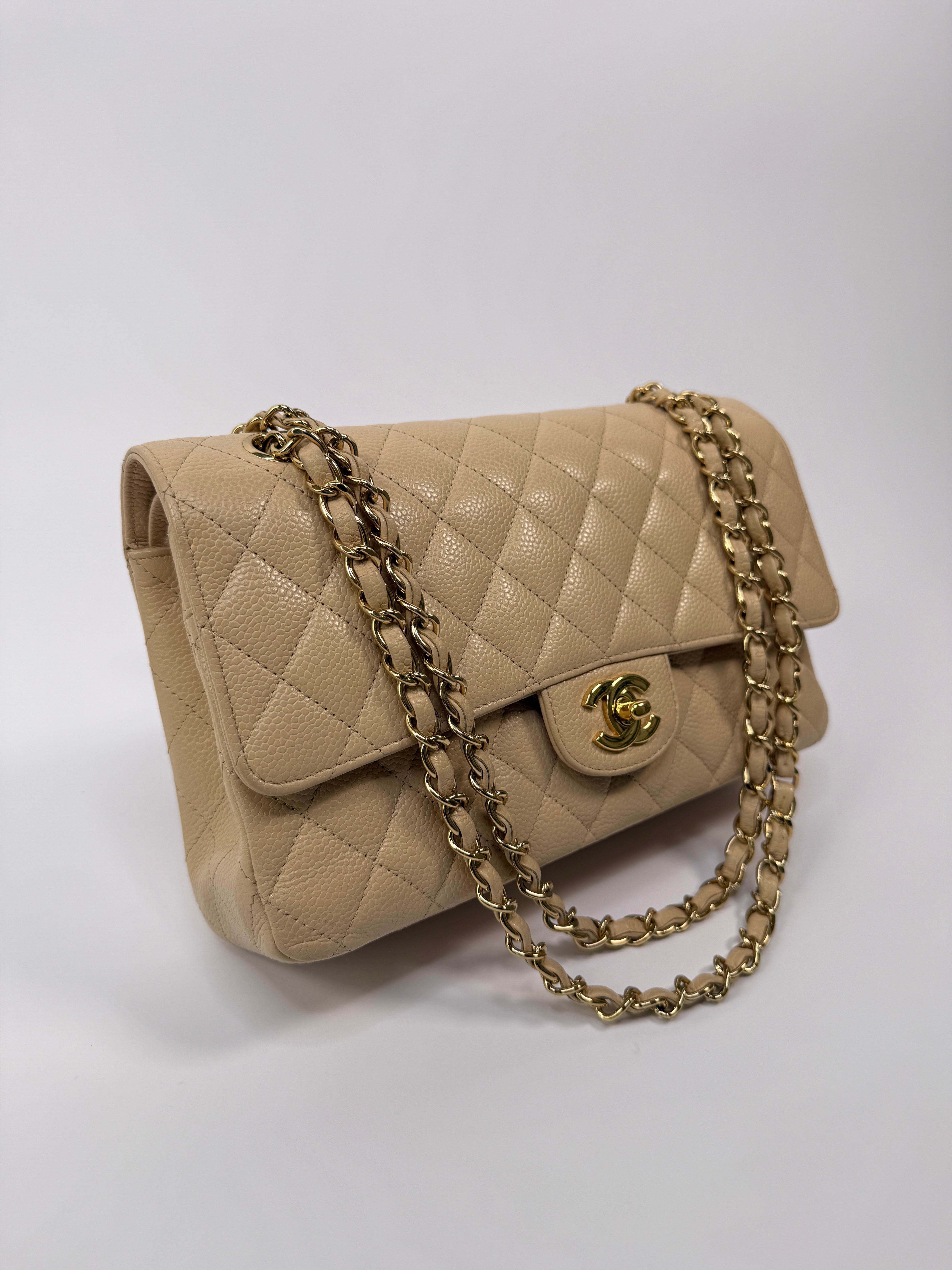 Chanel Medium Classic Double Flap Beige Caviar Leather With Gold Hardware
Pre Loved & Authentic