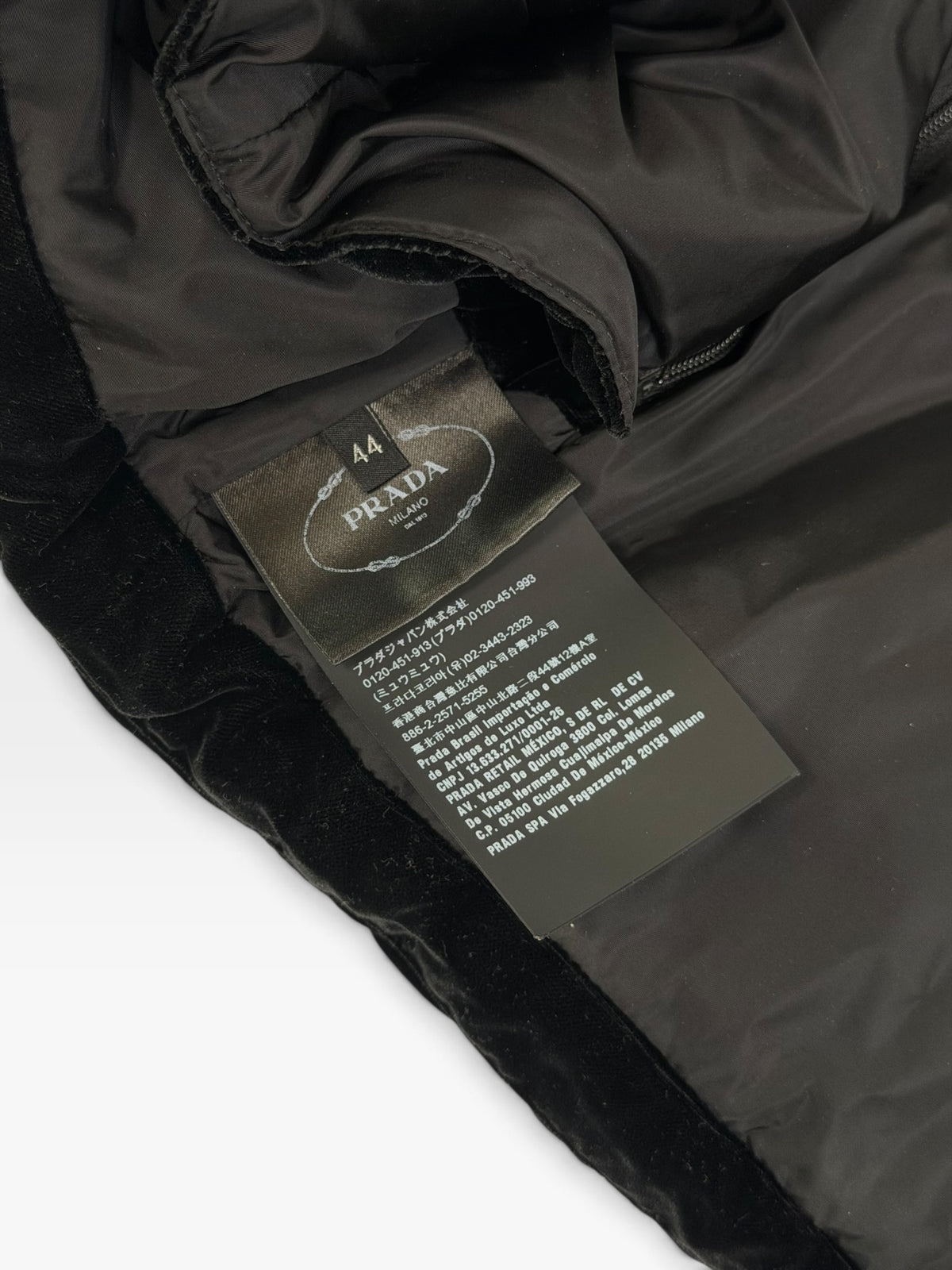 Prada Down-Filled Puffer Jacket In Black Velvet (Size 44/UK 12) 100% authentic and preloved in excellent condition