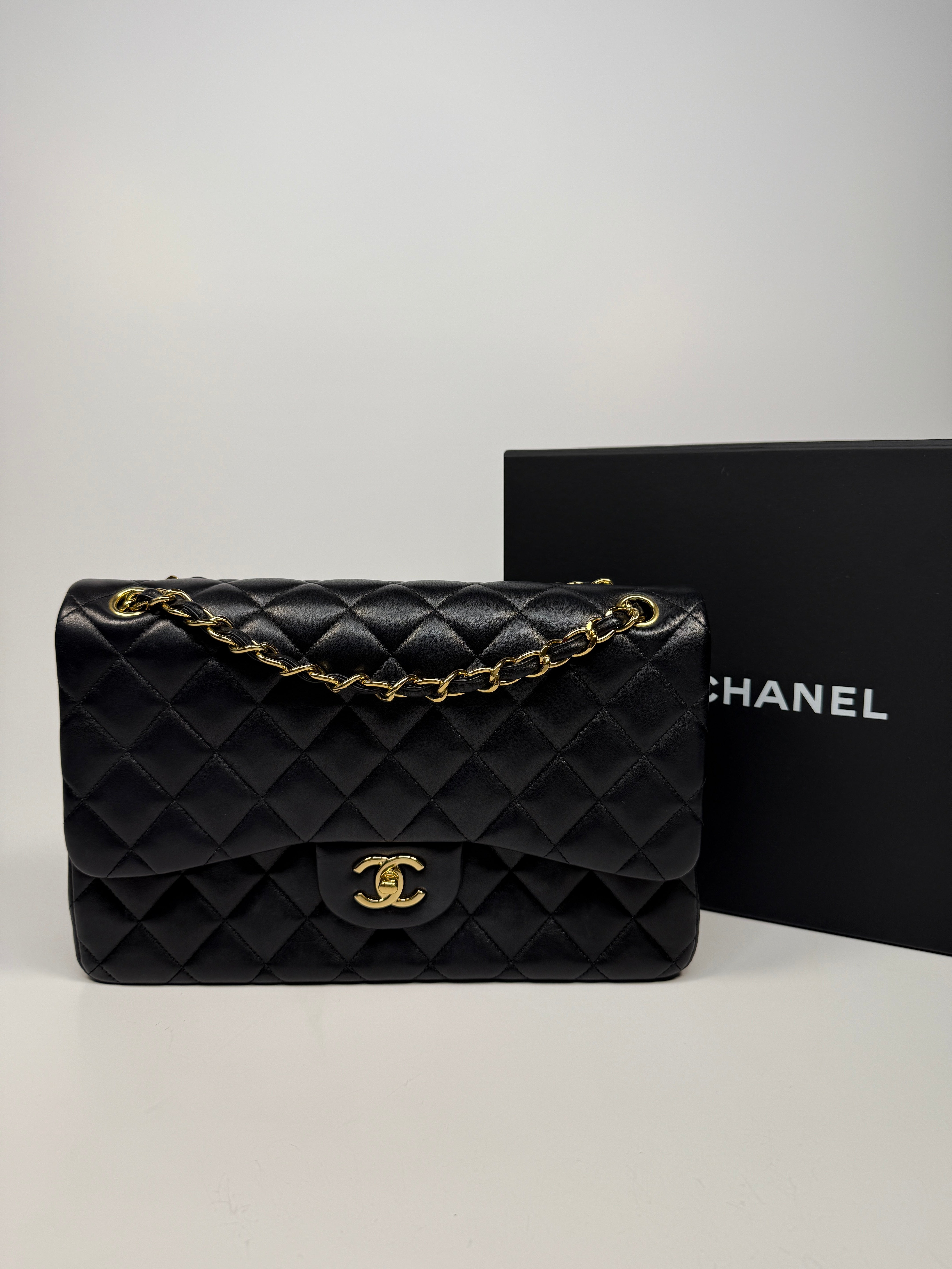 Chanel Jumbo Classic Flap Bag In Black Lambskin Leather With Gold Hardware
Pre Loved & Authentic