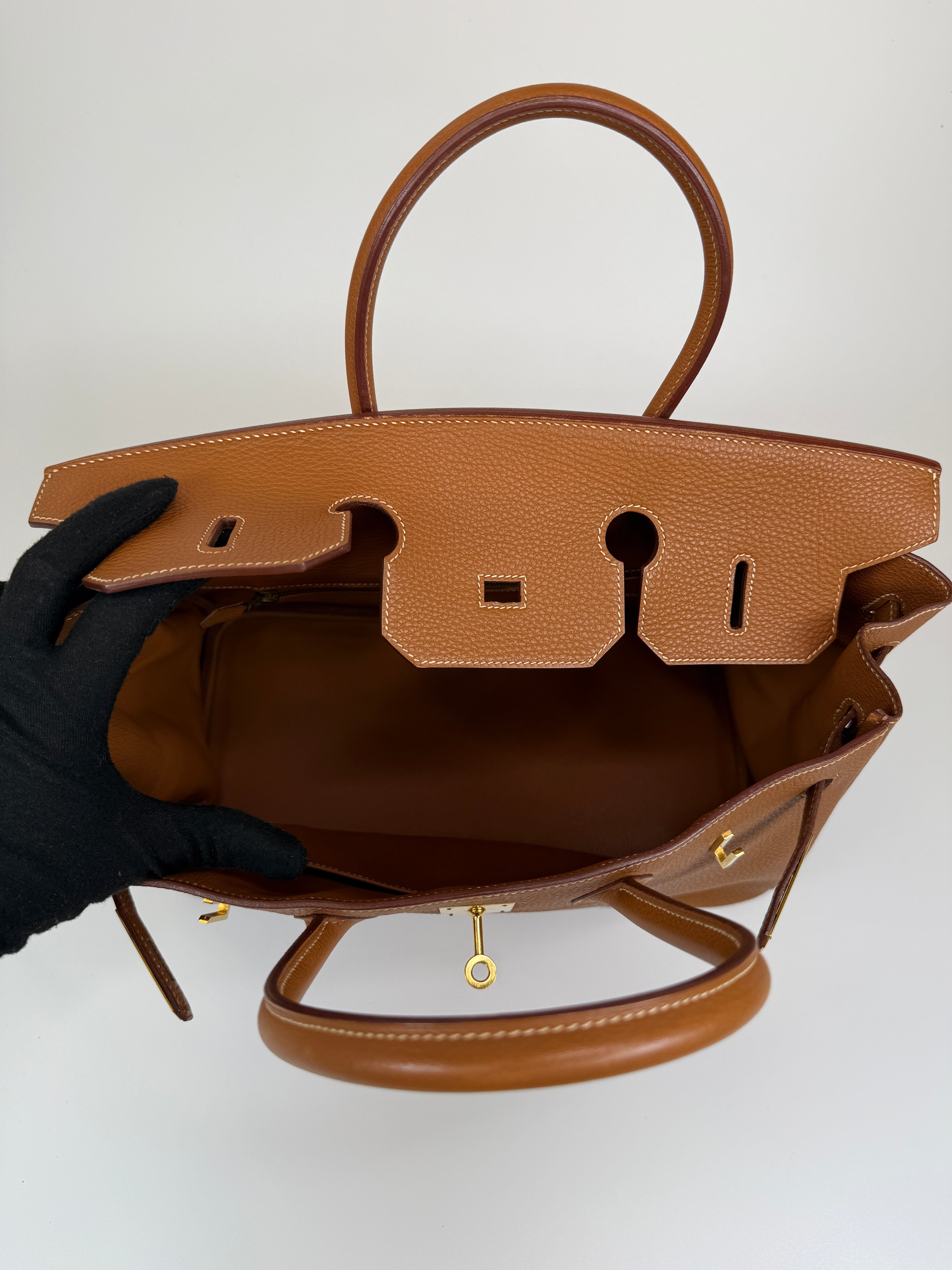 Authentic and preloved Hermès Birkin 35 In Gold Togo Leather With Gold Hardware. 100% Authenticity guarantee