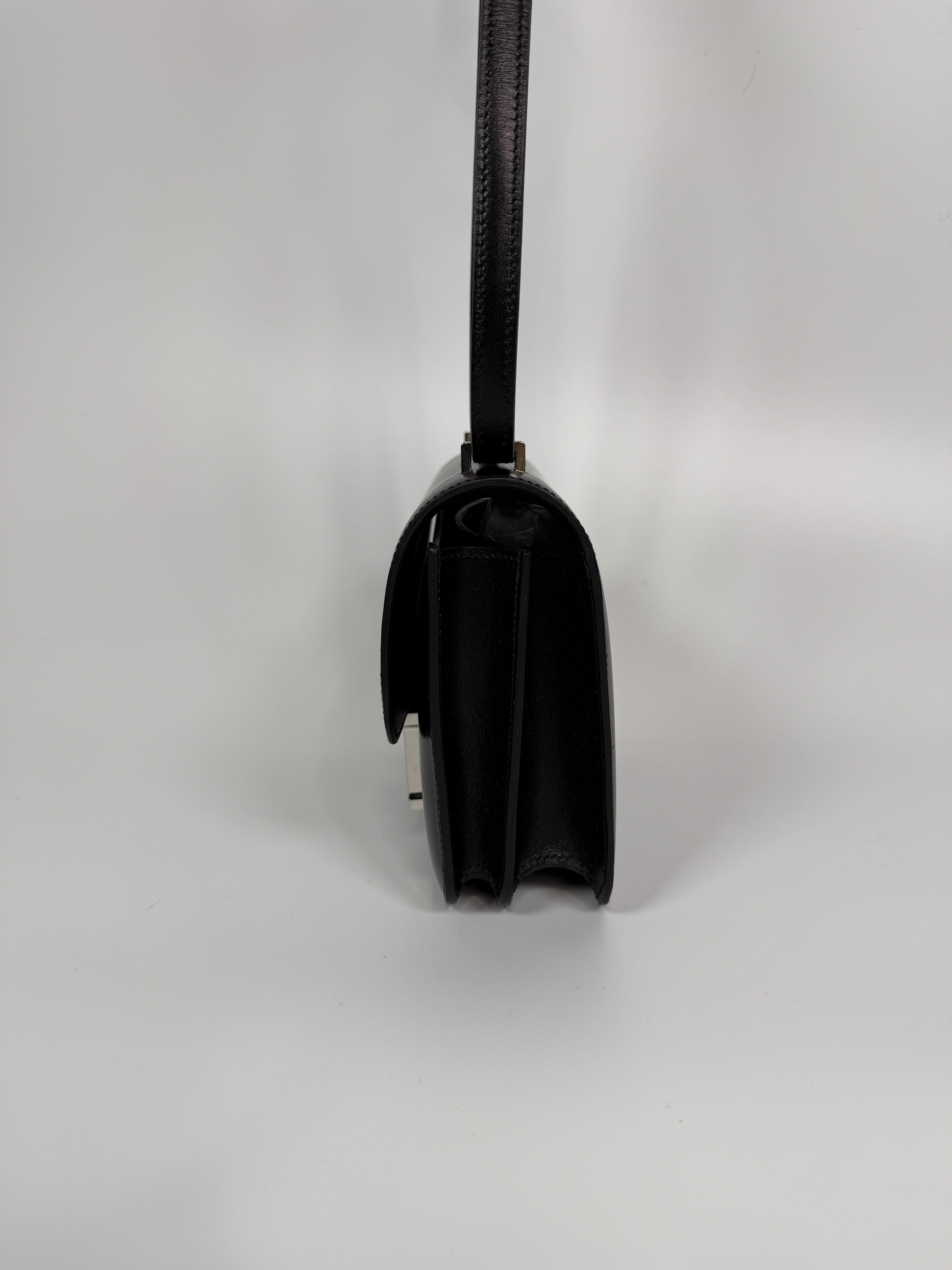 Authentic and preloved Hermès Constance 18 In Black Box Leather With Palladium Hardware. 100% Authenticity guarantee.