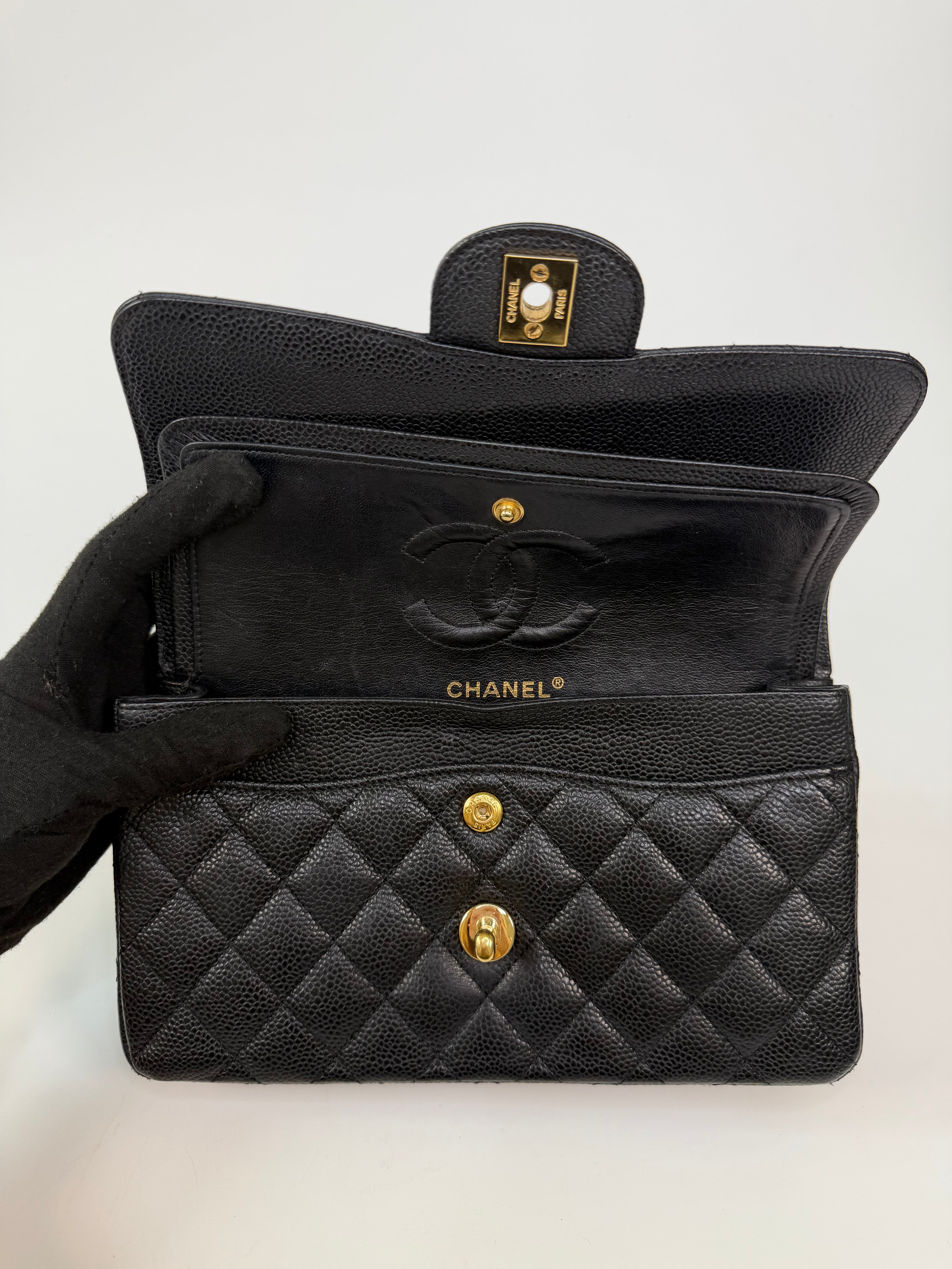 Chanel Small Classic Double Flap In Black Caviar Leather With Gold Hardware. 100% authentic and preloved in excellent condition