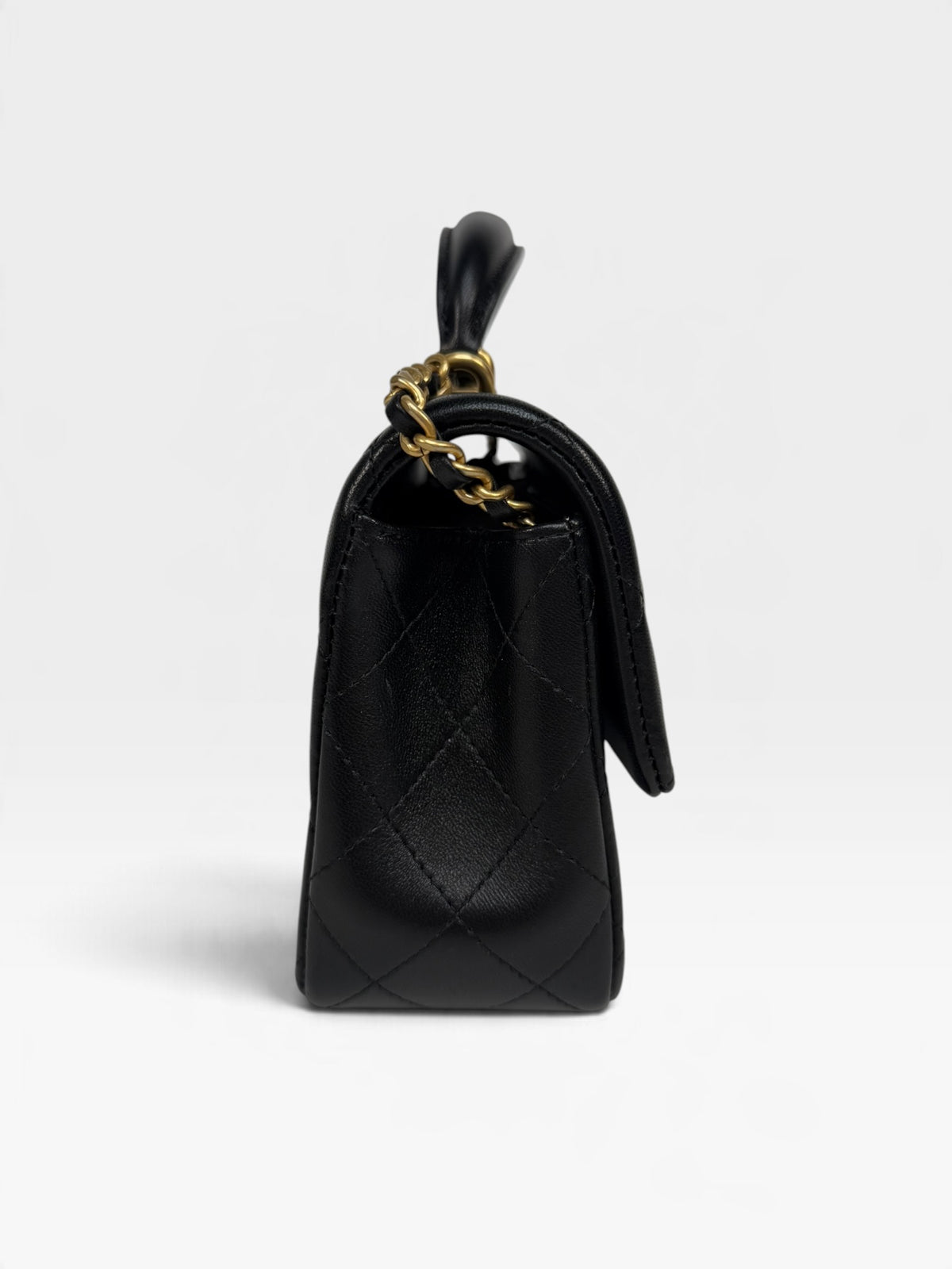 Chanel Mini Rectangle Top Handle In Black Lambskin With Gold Hardware. 100% authentic and pre loved in excellent condition.