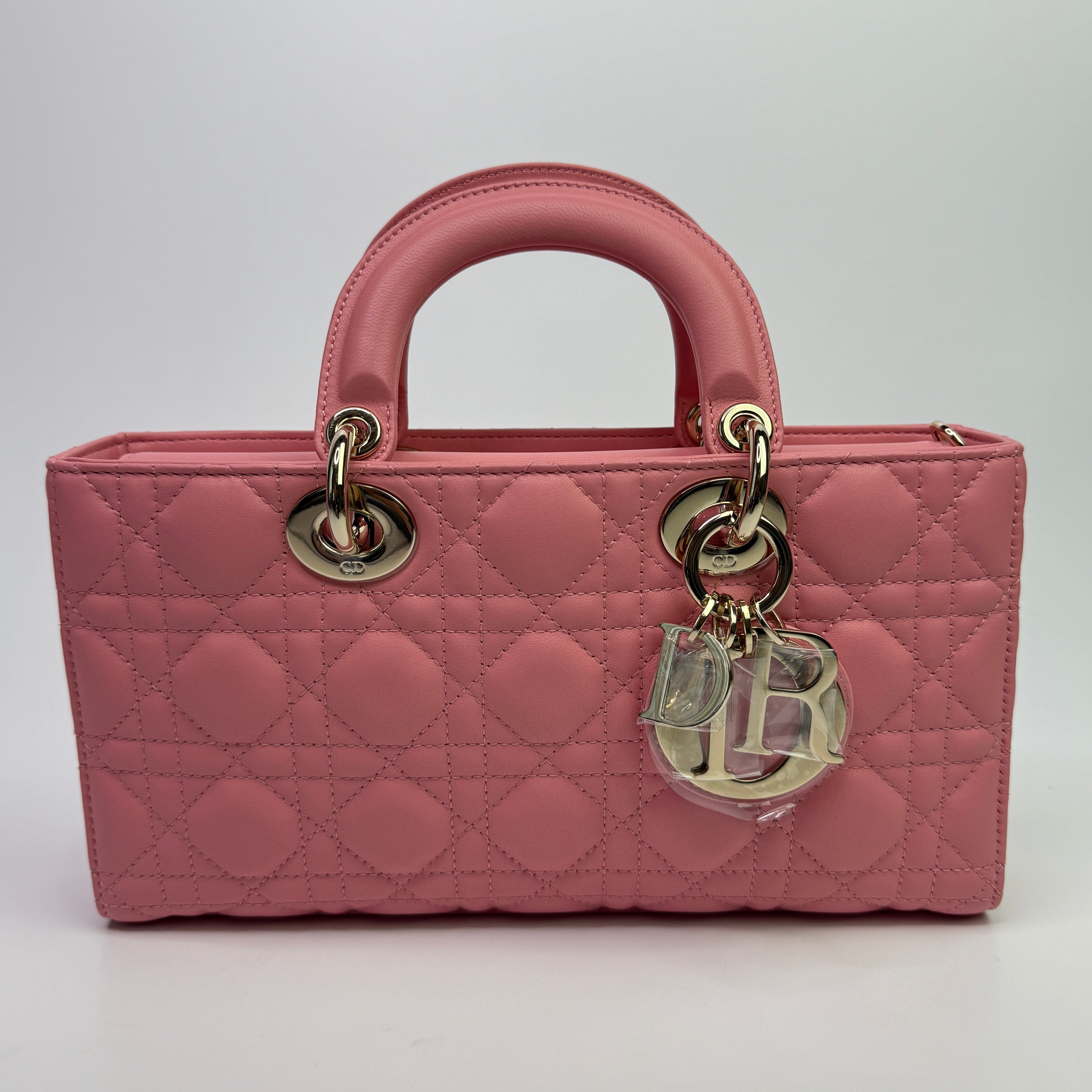 Authentic pre-loved Christian Dior Medium D-Joy bag. New & Unused.