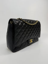 Chanel Maxi Classic Double Flap In Black Caviar Leather With GHW