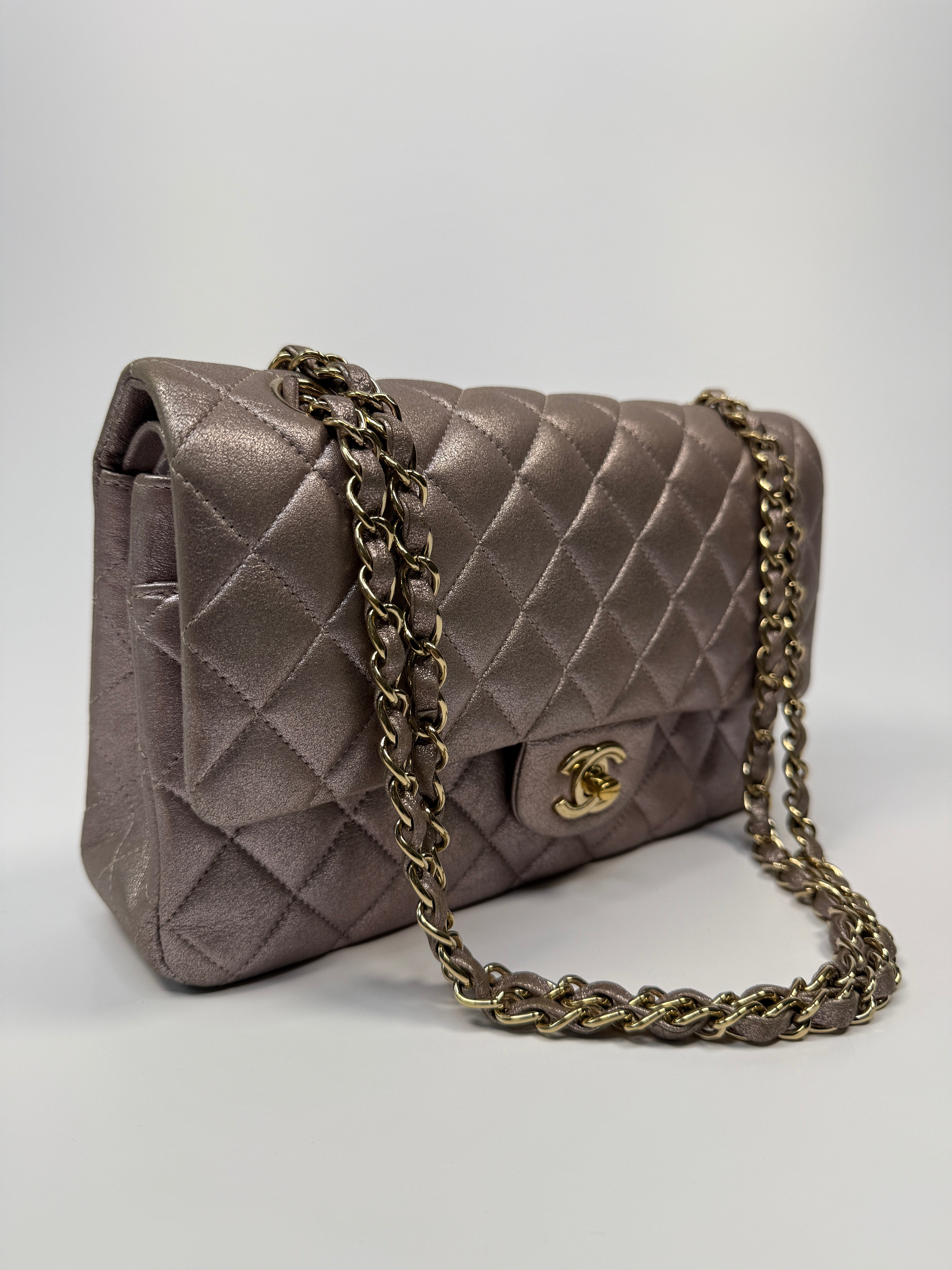 Authentic pre-loved Chanel Iridescent Rose Medium Classic Double Flap With Gold Hardware.