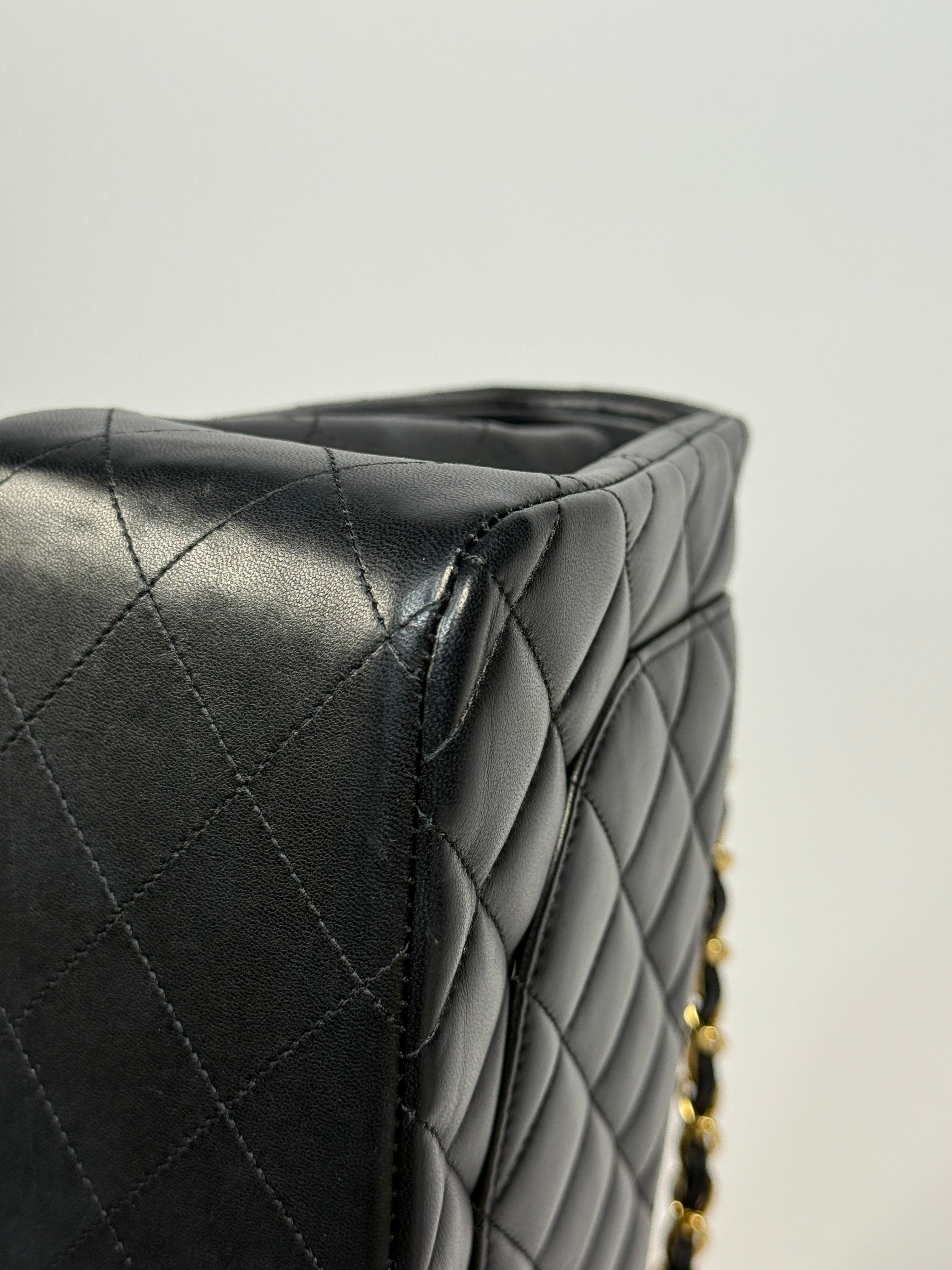 Chanel Jumbo Classic Flap Bag In Black Lambskin Leather With Gold Hardware
Pre Loved & Authentic