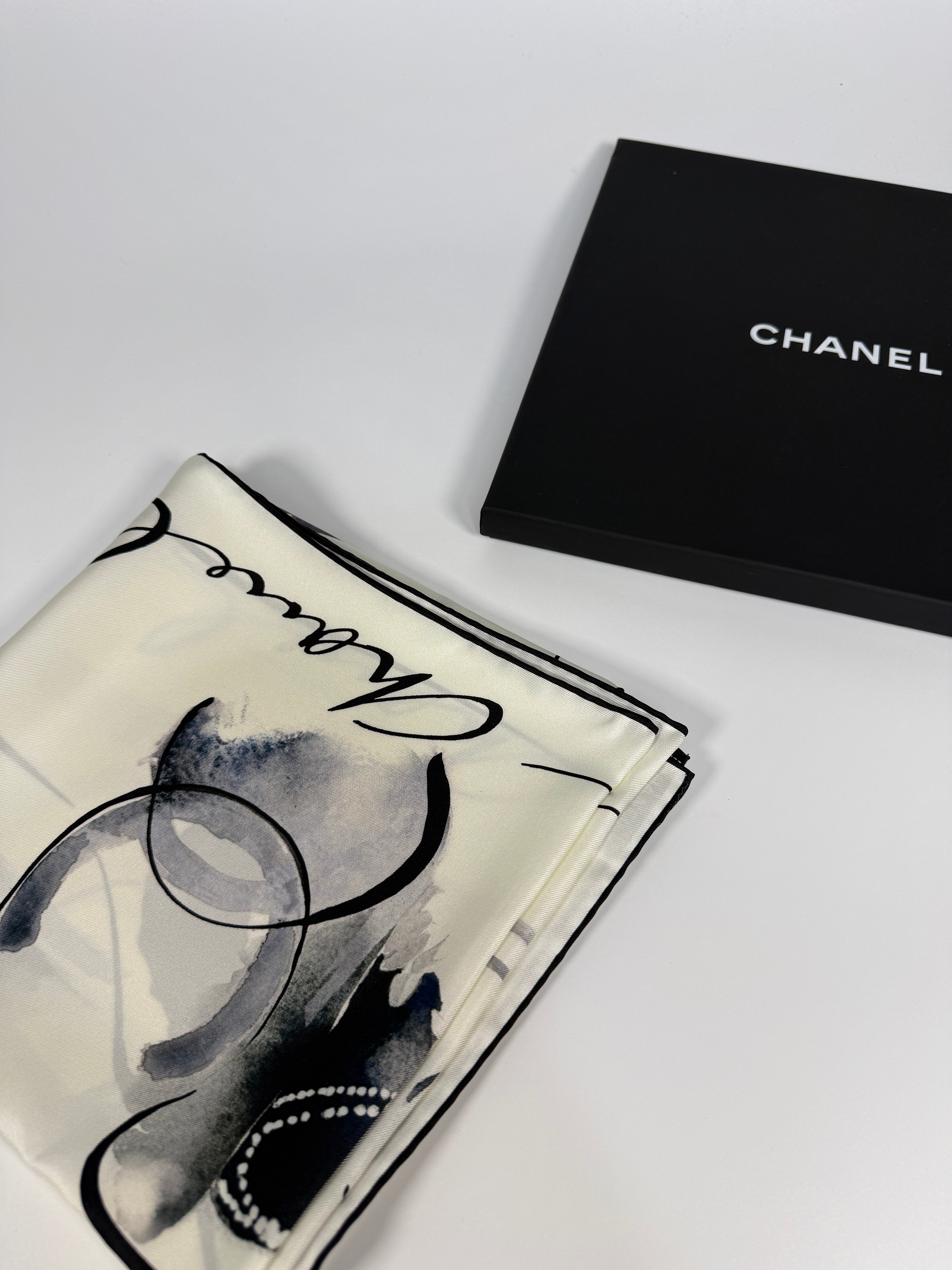 Authentic and preloved Chanel CC Silk Scarf Excellent condition. 100% Authenticity Guarantee
