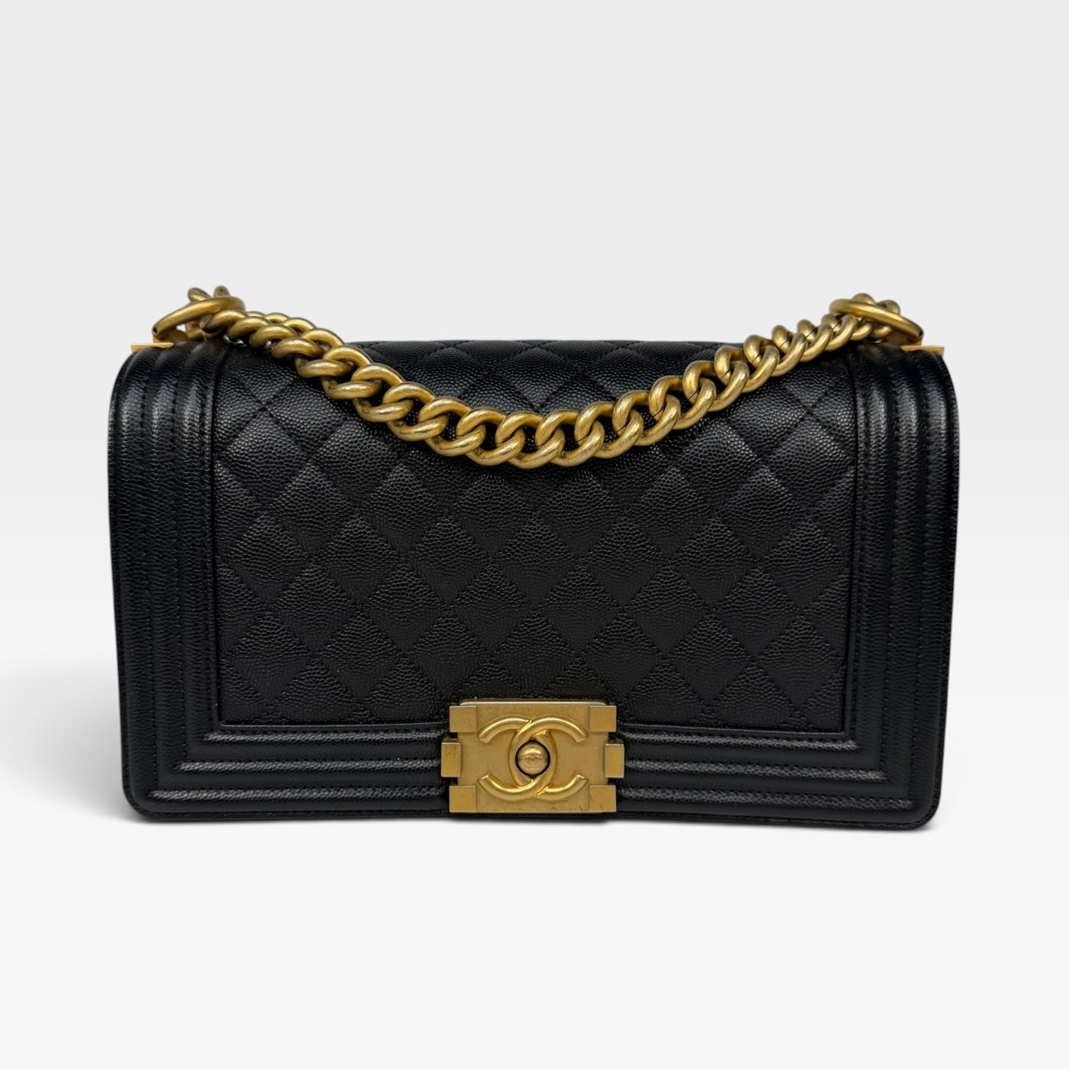Chanel Boy Bag In Black Caviar Leather With Gold Hardware. Authentic and preloved in excellent condition. Insured next day delivery. Verified by Luxe Cheshire