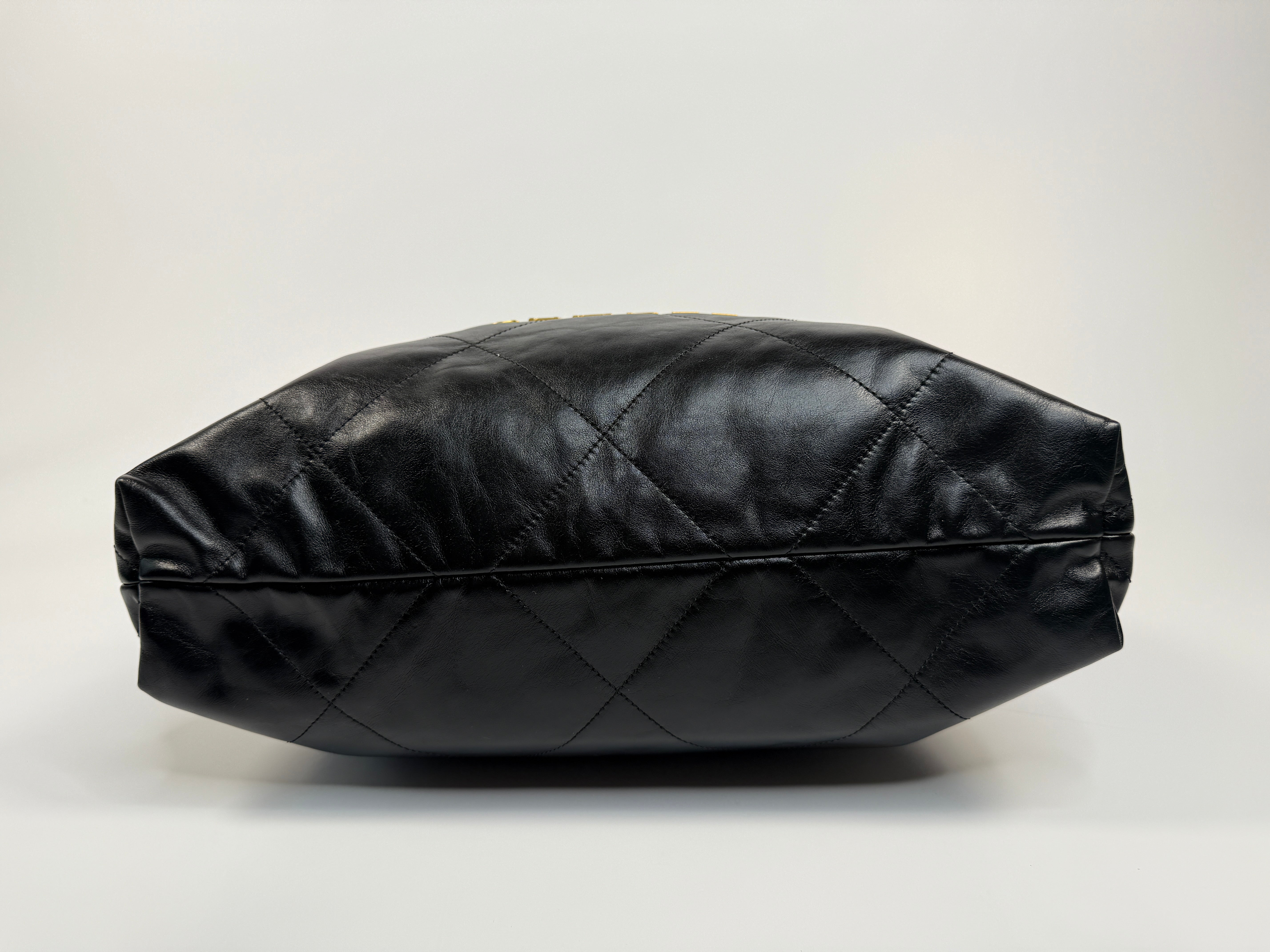 Chanel 22 Handbag In Black Calfskin Leather With Gold Hardware. Excellent Condition. Authentic and Preloved