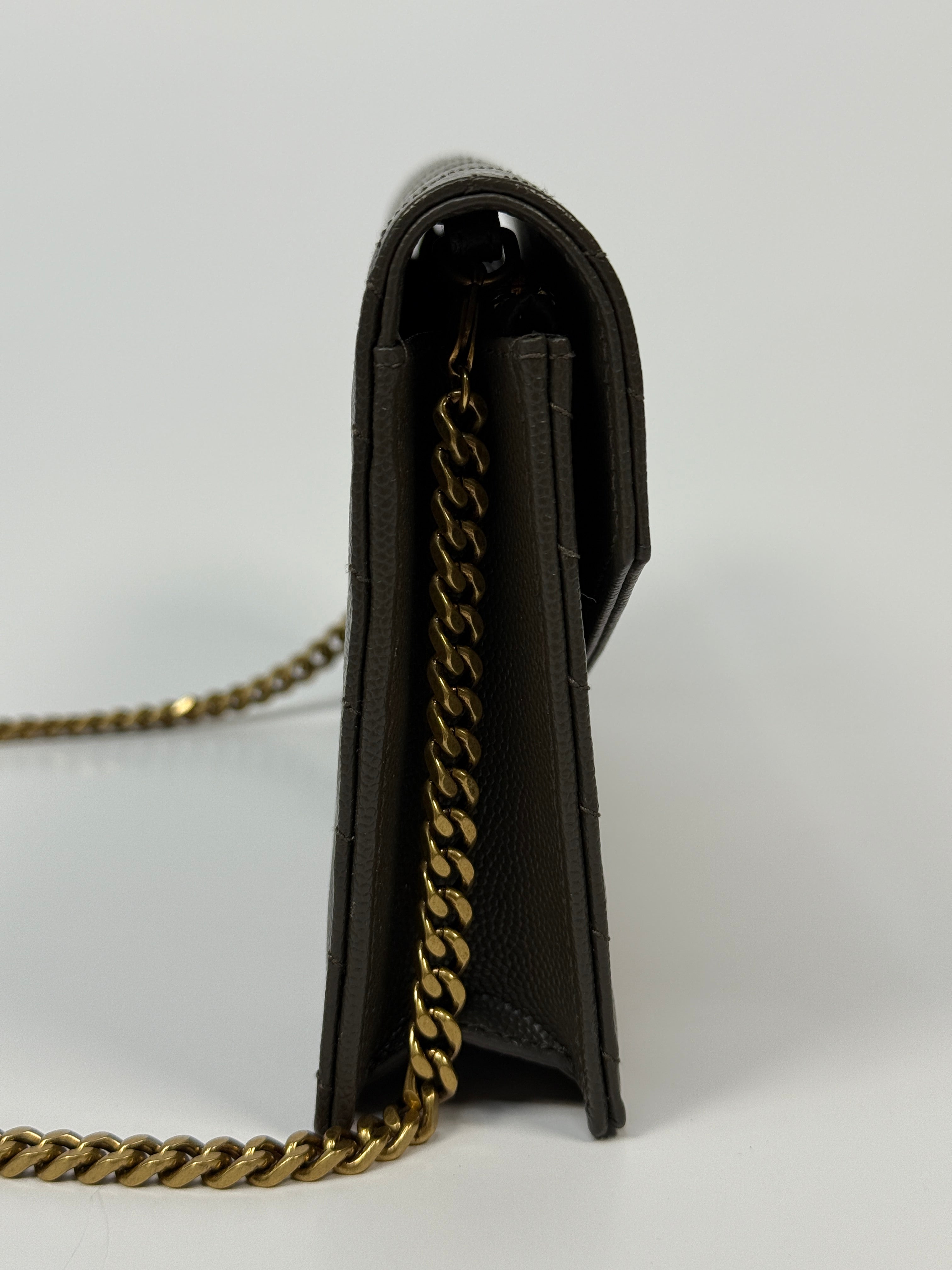 Saint Laurent Cassandre Matelassé Textured- Leather Wallet On Chain In Khaki With Gold Hardware. Authentic and preloved. Excellent condition. 100% Authenticity guarantee