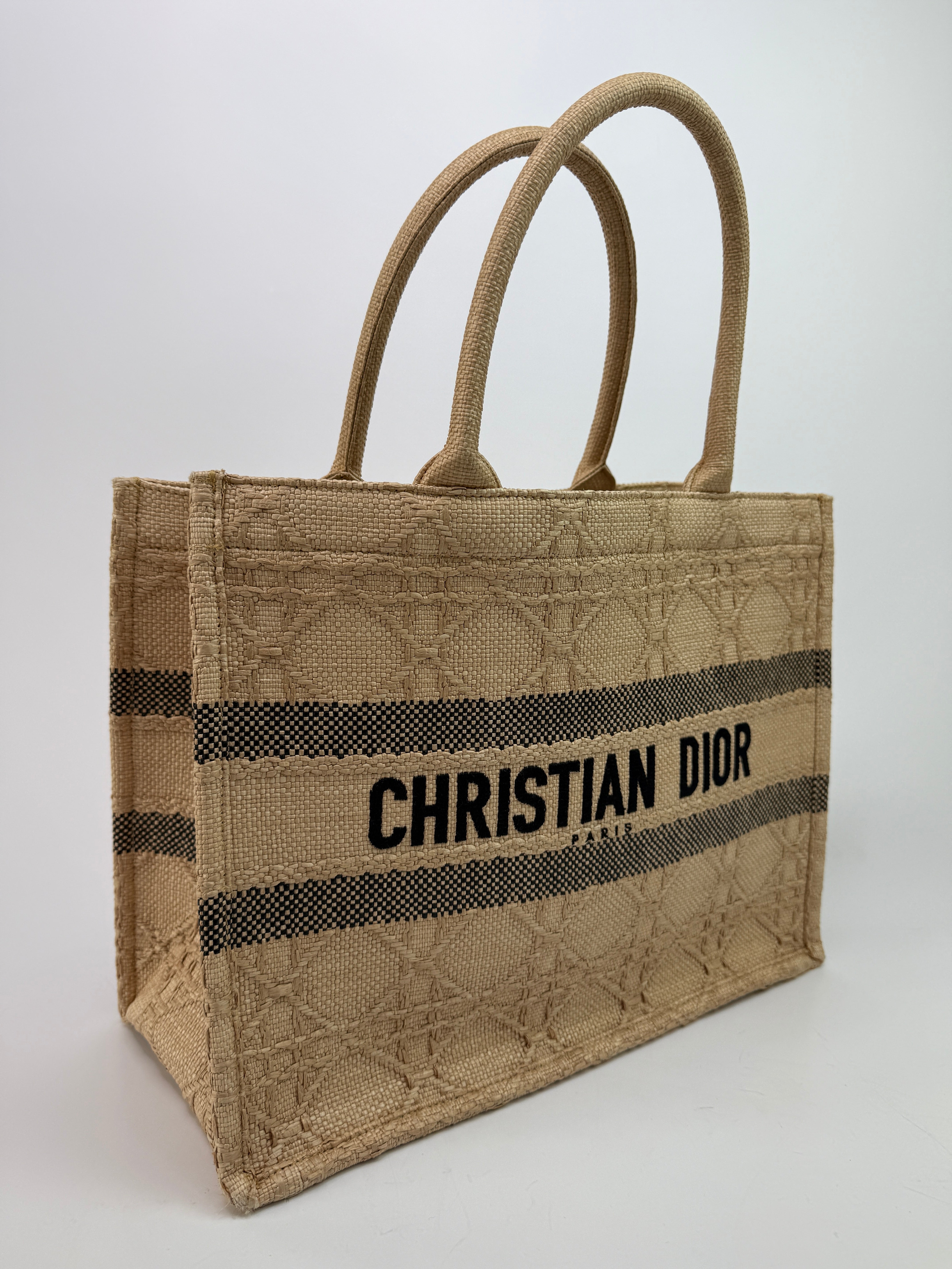 Authentic pre-loved Christian Dior Medium Raffia Cannage Book Tote.