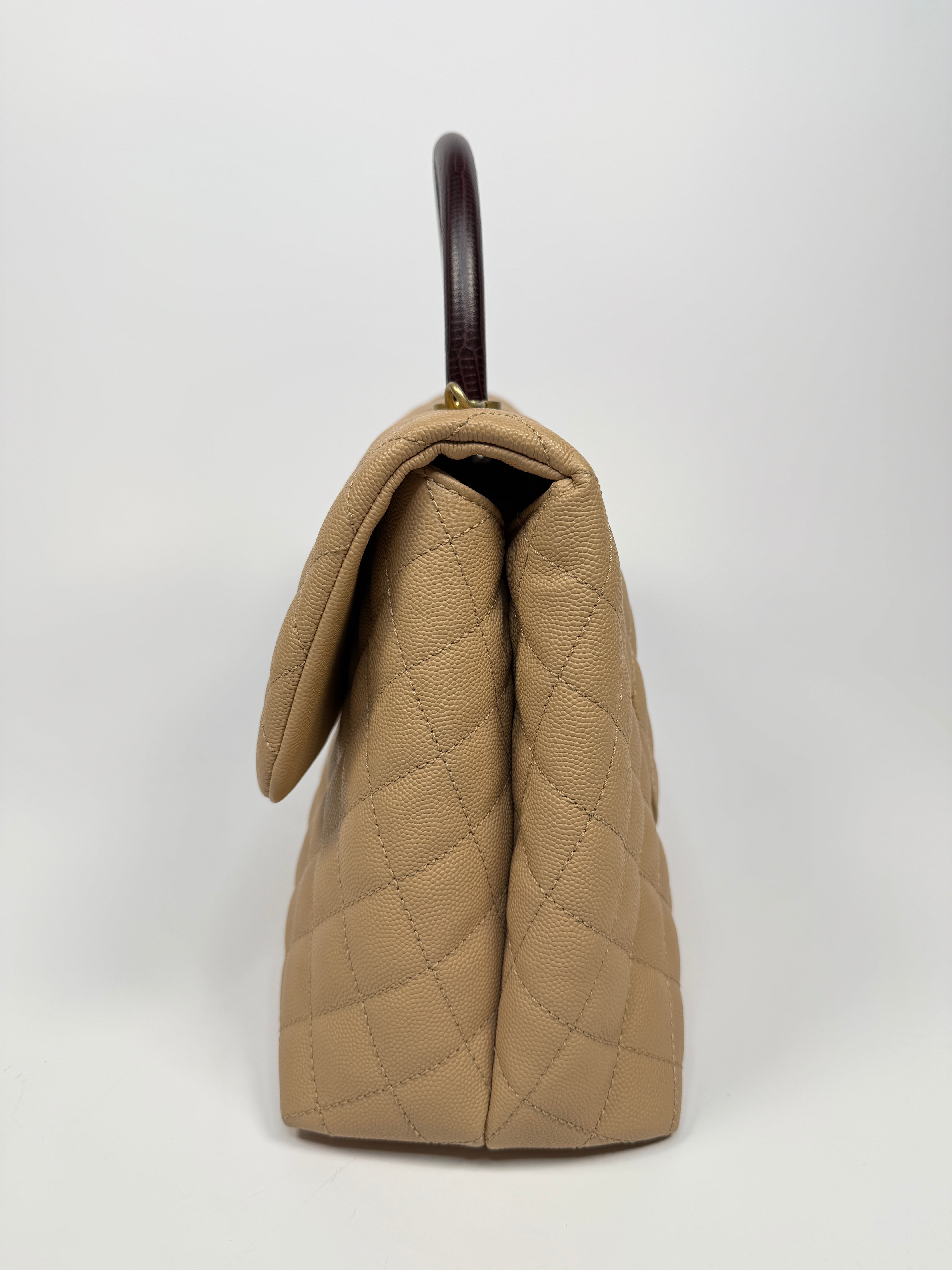 Chanel Coco Large Top Handle In Beige Caviar Leathe With Gold Hardware
Pre Loved & Authentic