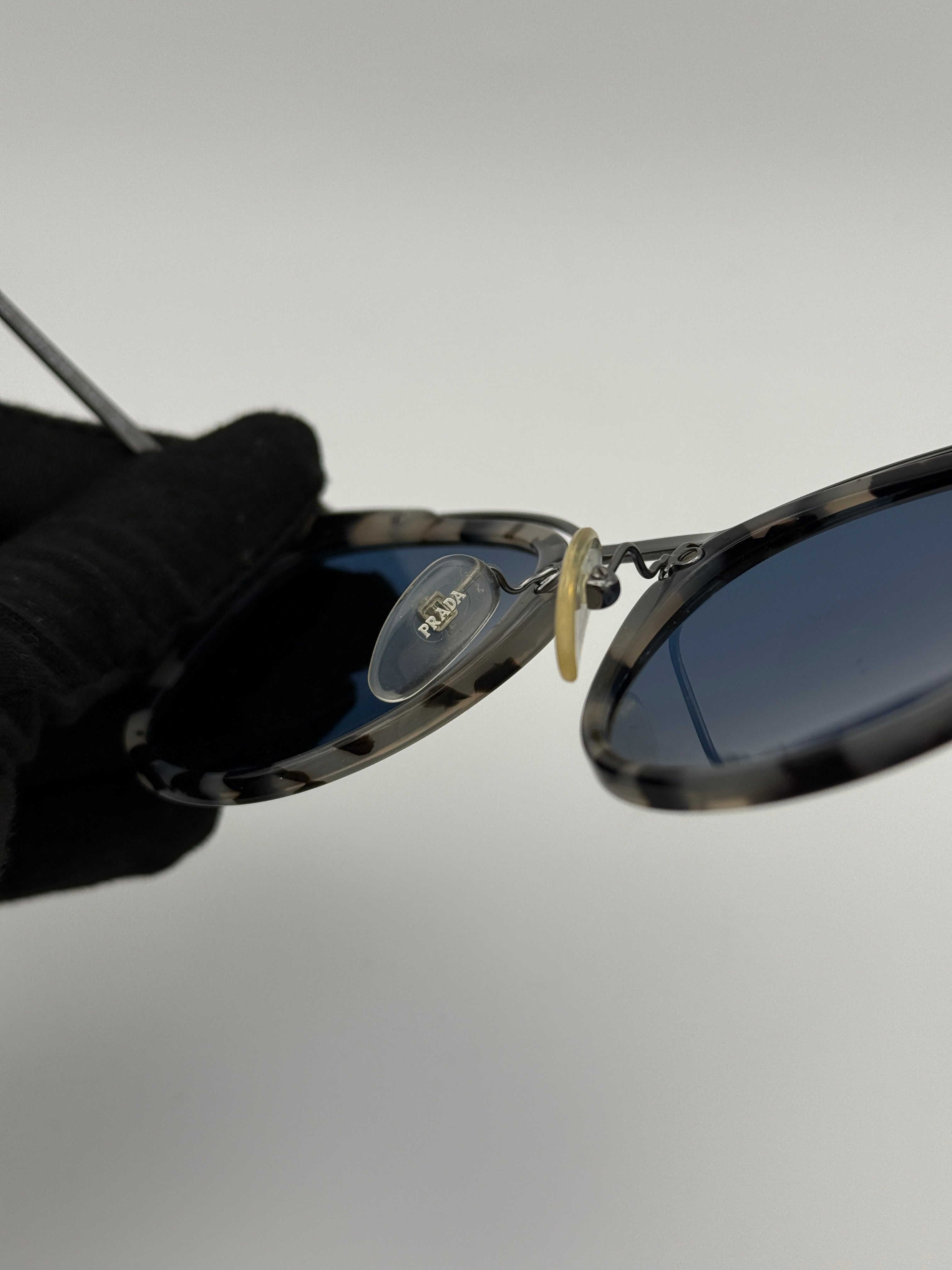 Prada SPR 20U sunglasses. 100% Authenticity guarantee. verified by Luxe Cheshire