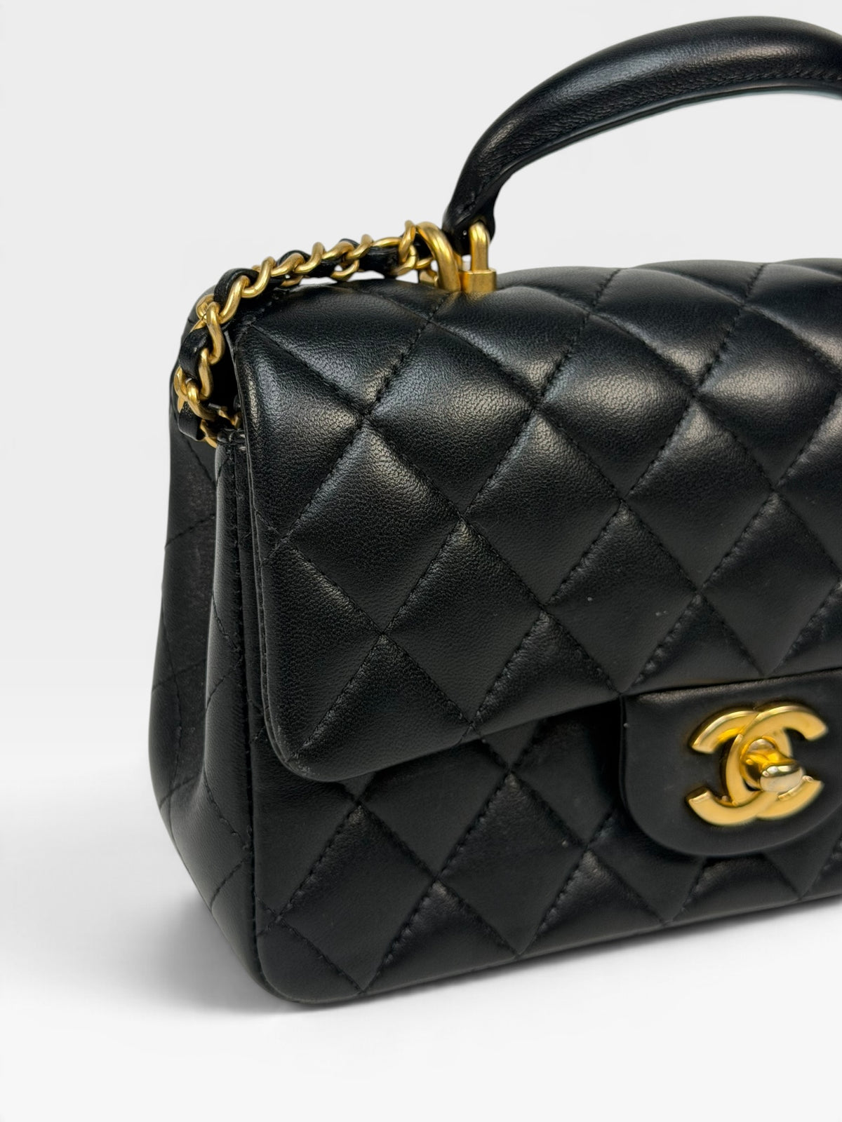 Chanel Mini Rectangle Top Handle In Black Lambskin With Gold Hardware. 100% authentic and pre loved in excellent condition.