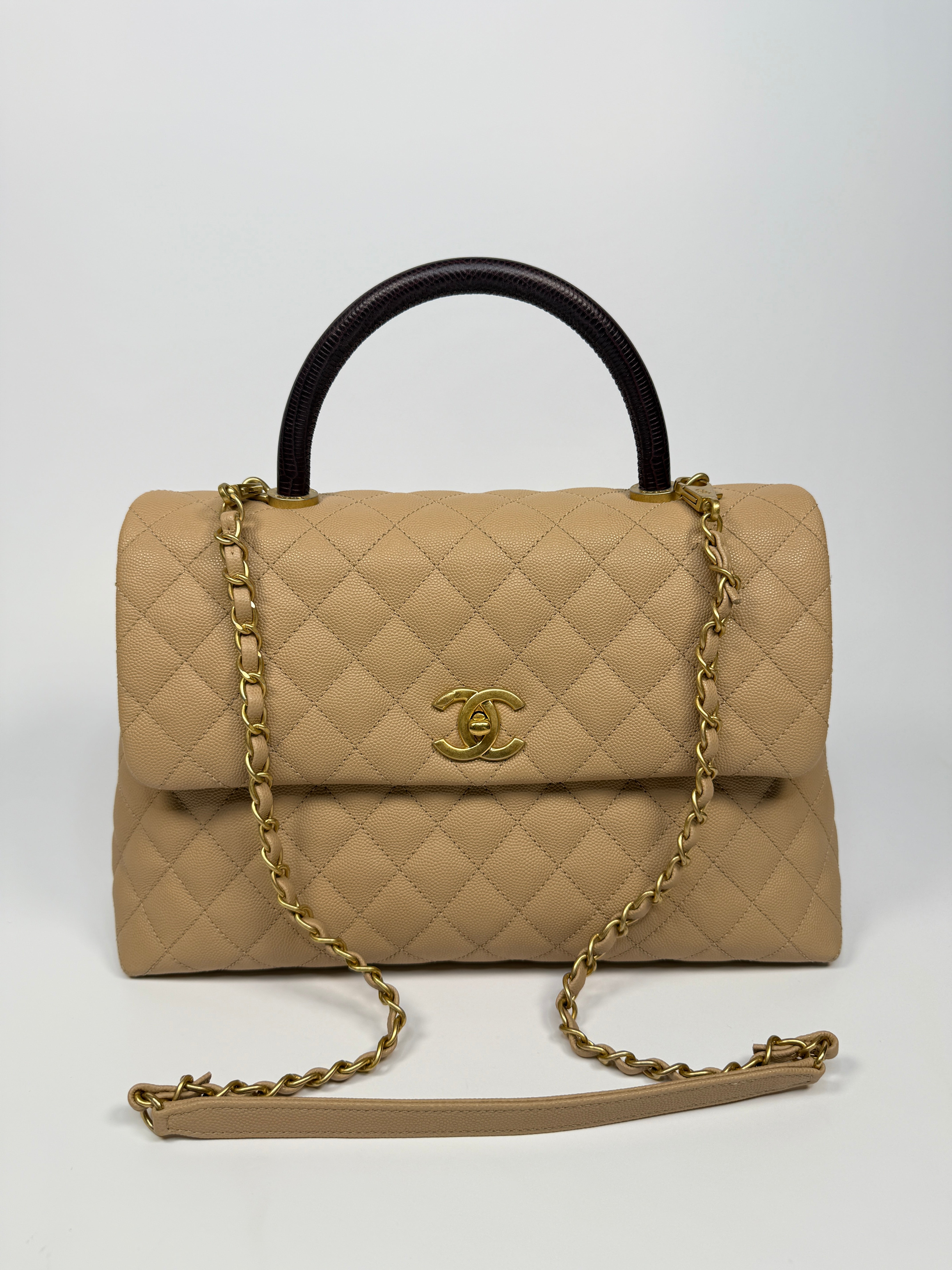 Chanel Coco Large Top Handle In Beige Caviar Leathe With Gold Hardware
Pre Loved & Authentic
