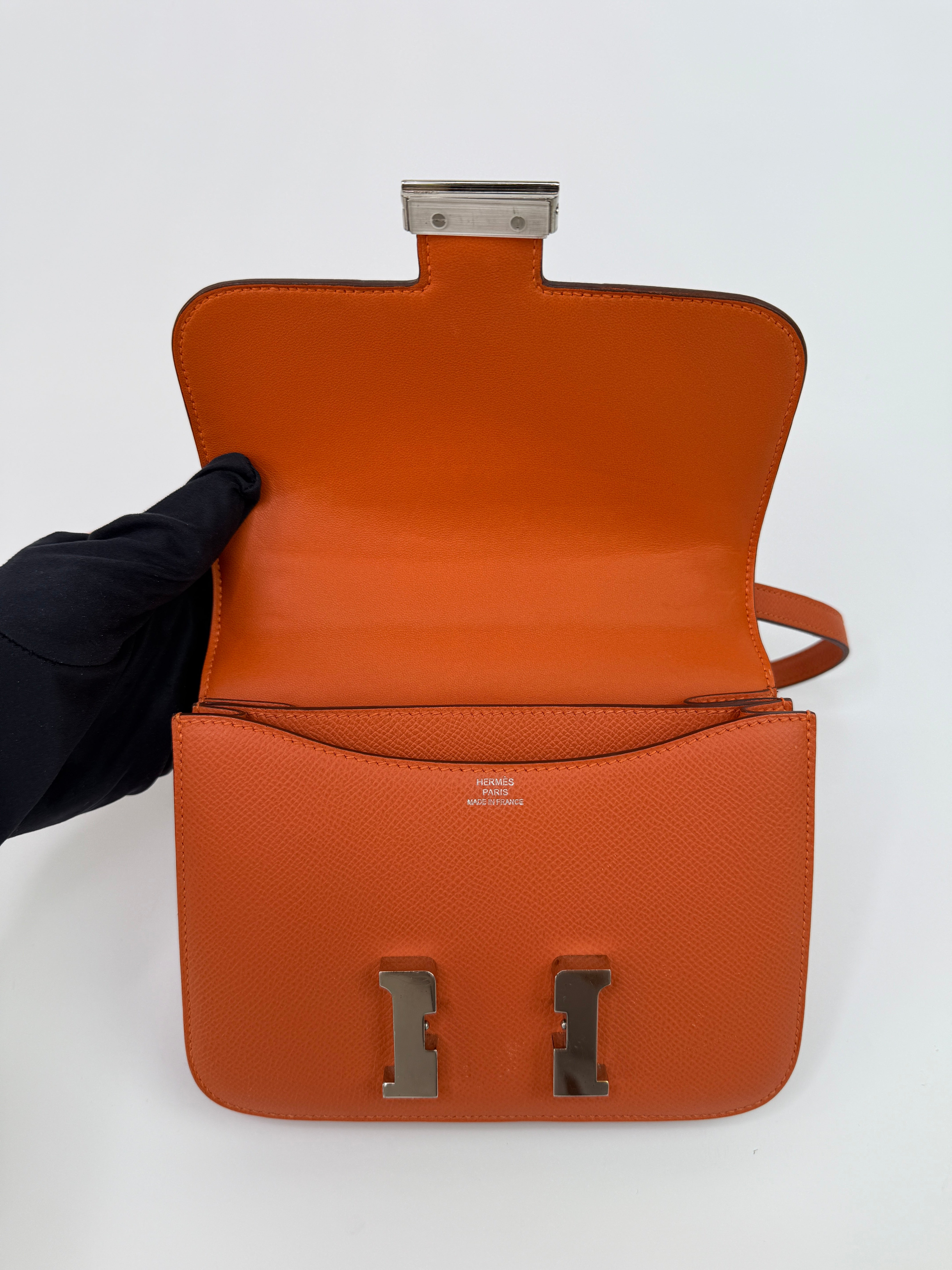 Authentic Pre Loved Hermès Constance 18 In Orange Epsom Leather With Palladium Hardware Very Good Condition