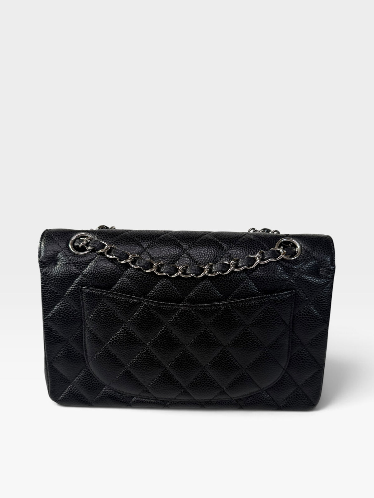 Chanel Vintage Small Classic Double Flap In Black Caviar Leather With Silver Hardware. 100% authentic and preloved in excellent condition