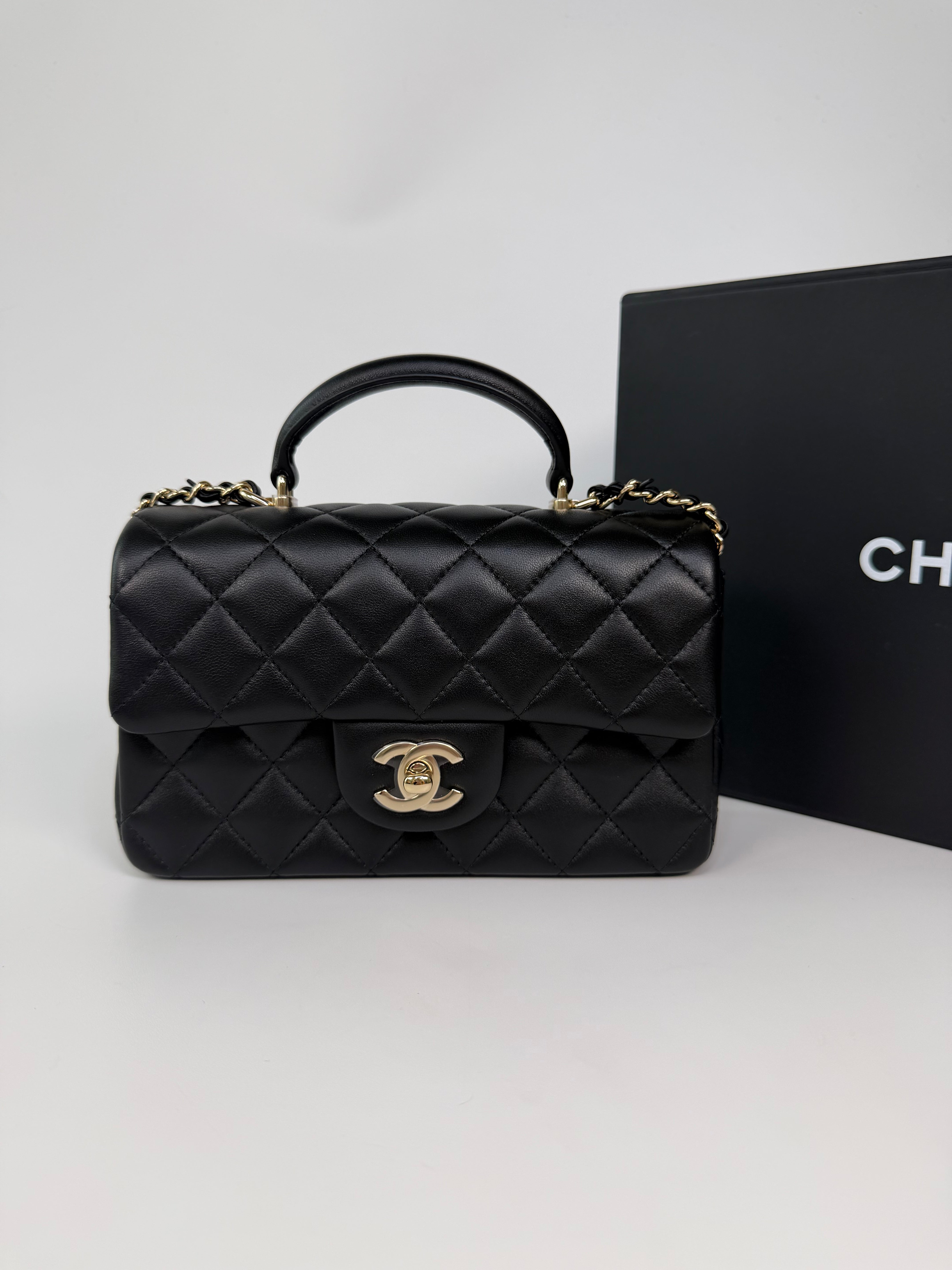 Chanel Mini Rectangle Top Handle In Black Lambskin Leather With Pale Gold Hardware