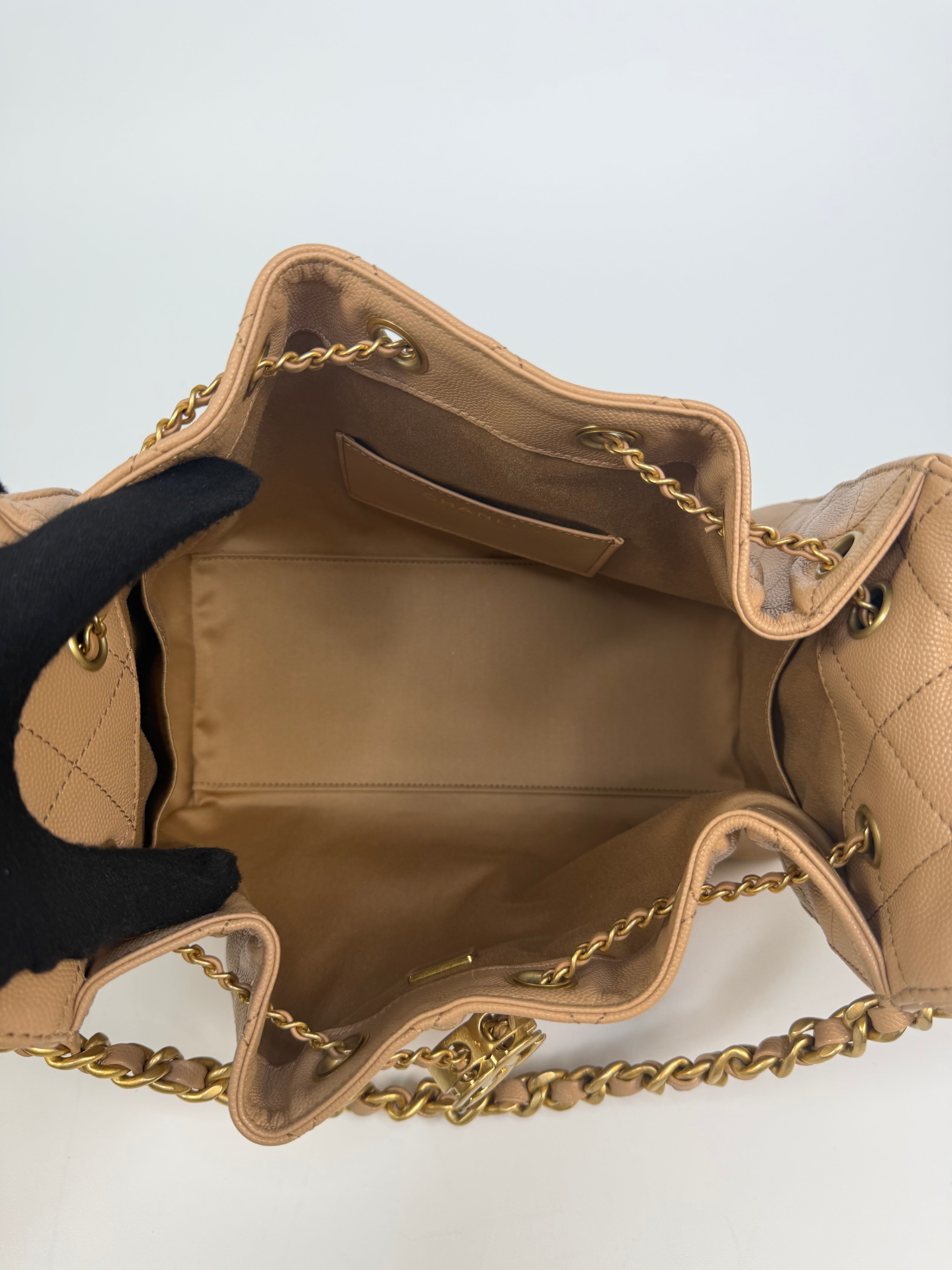 Chanel 25 Small In Beige Caviar Leather With Gold Hardware. 100% authentic and preloved in excellent condition