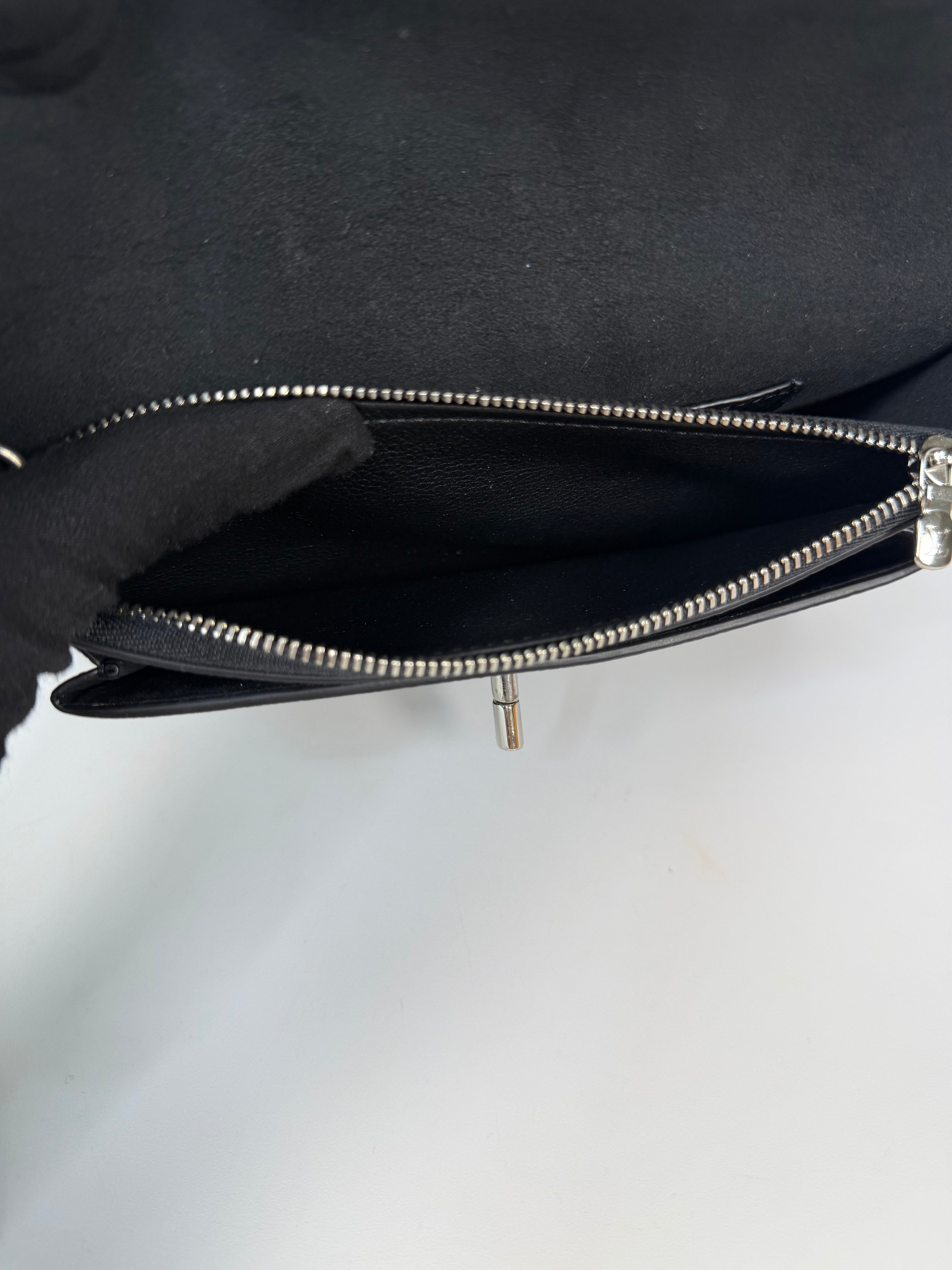 Louis Vuitton Pochette Chain MyLockMe In Black Leather With Silver Hardware in excellent condition 100% authentic and preloved